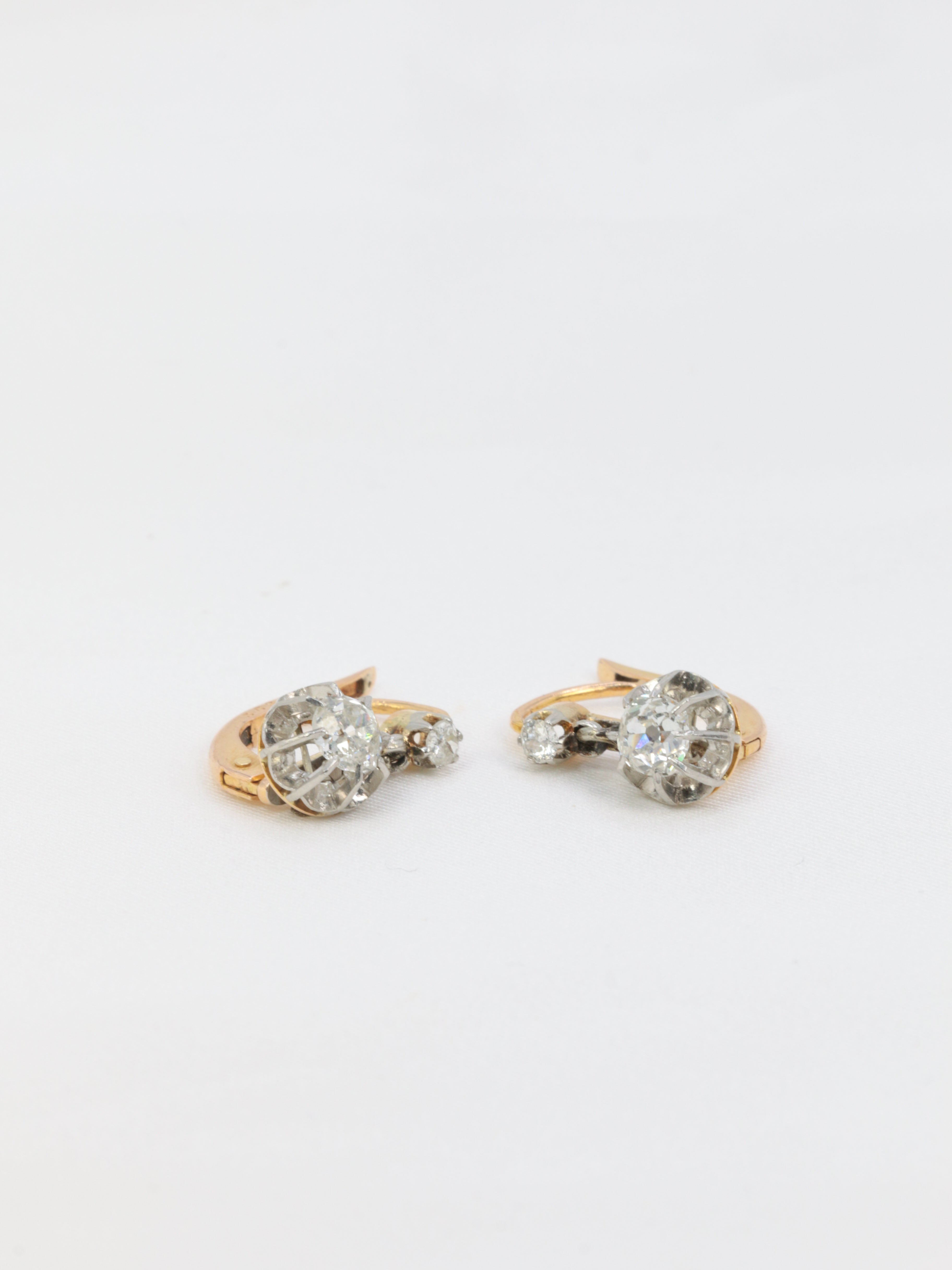 Antique sleeper earrings in gold, silver and old cut diamonds
