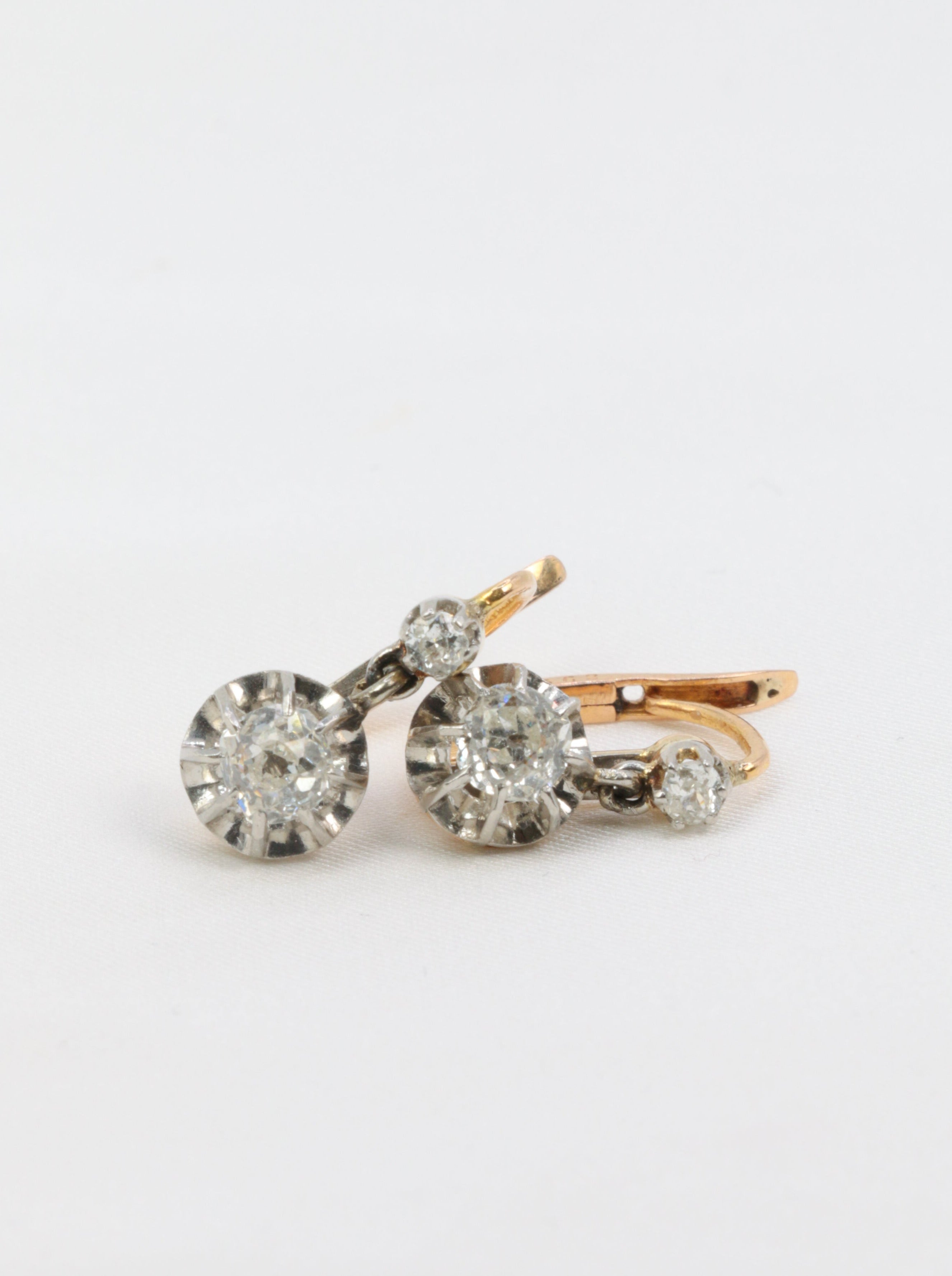 Antique sleeper earrings in gold, silver and old cut diamonds