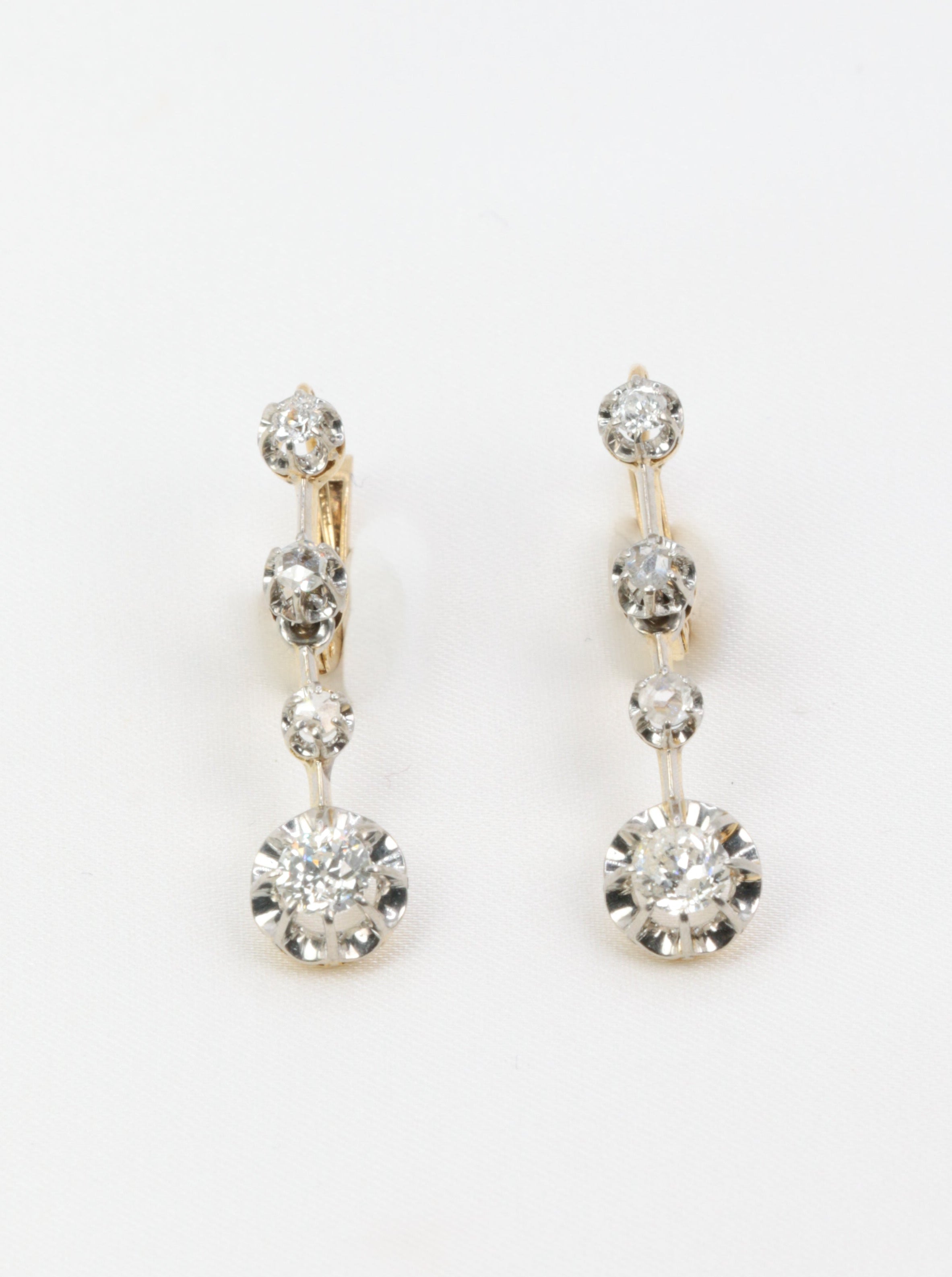 Antique sleeper earrings in gold, silver and old cut diamonds