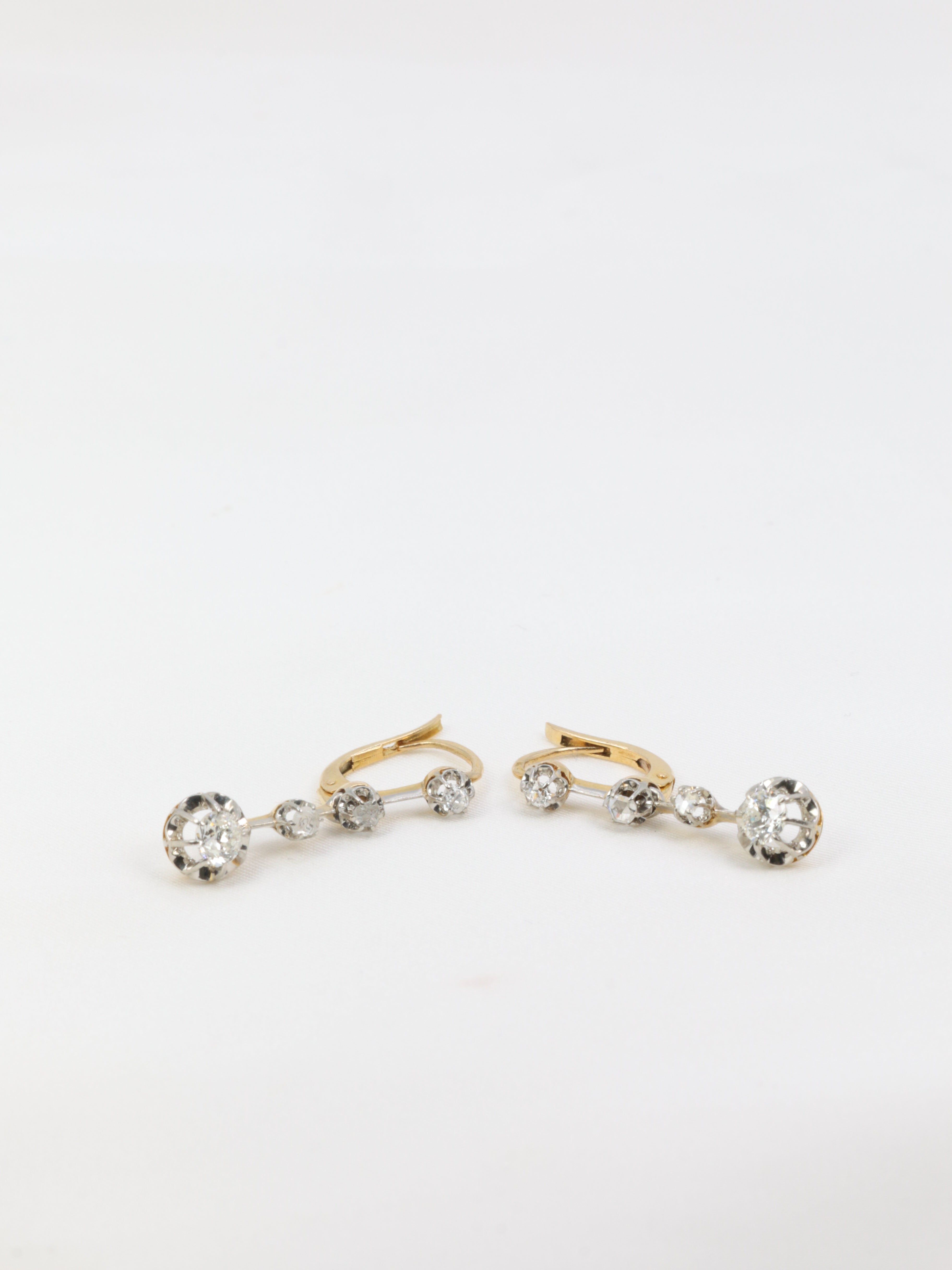 Antique sleeper earrings in gold, silver and old cut diamonds