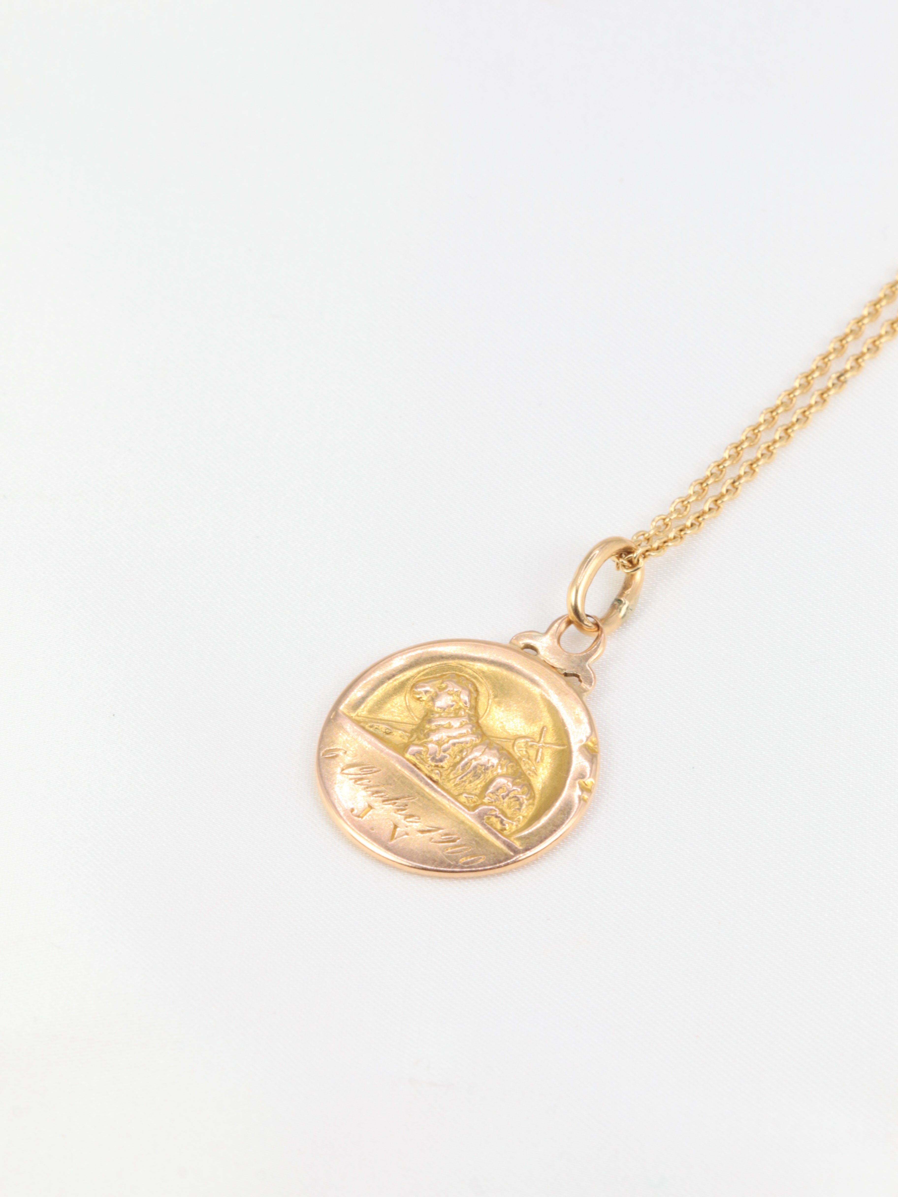 Art Nouveau medal depicting Saint John and the lamb in yellow gold