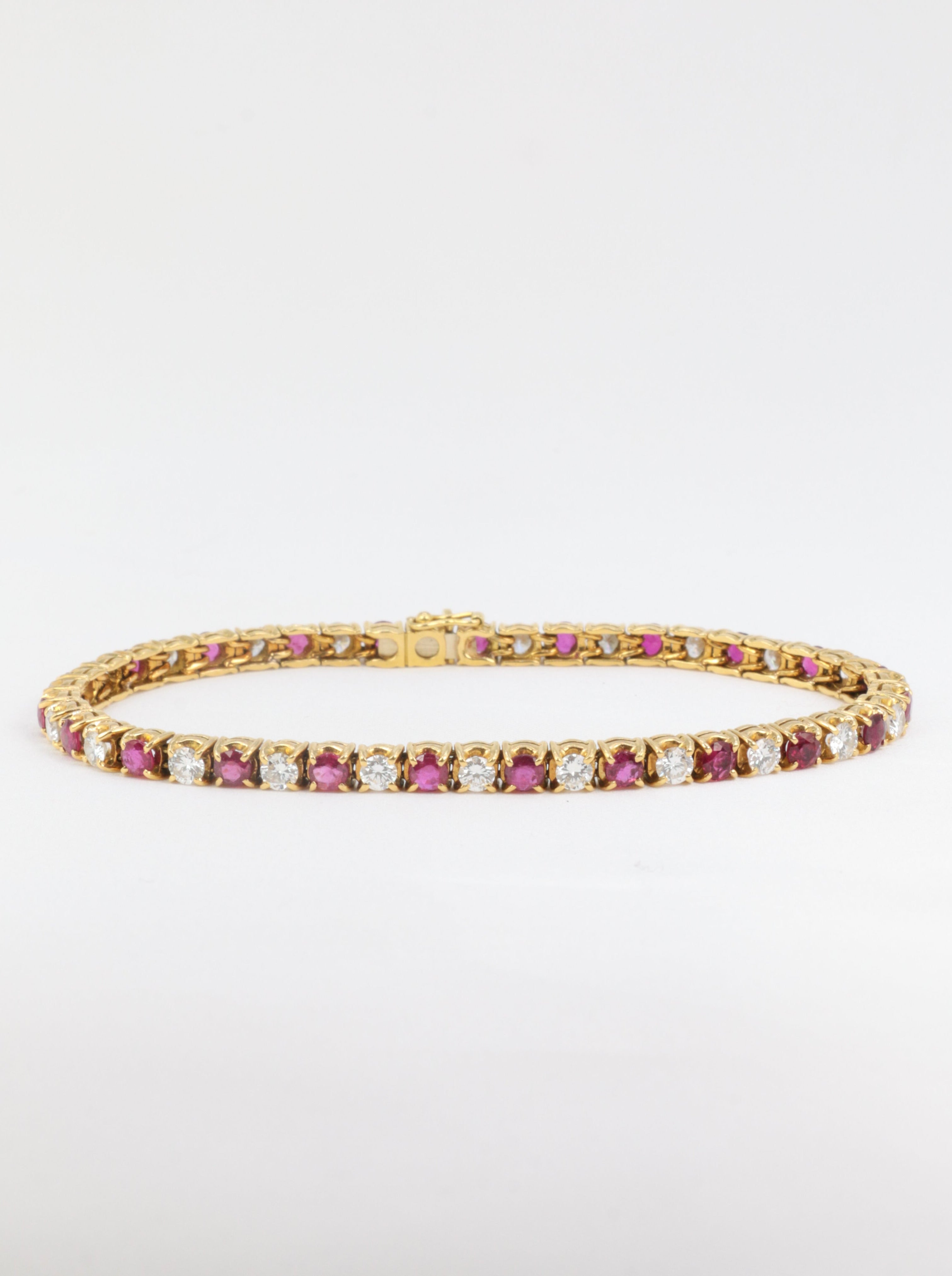 Bracelet tennis vintage en or, rubis et diamants