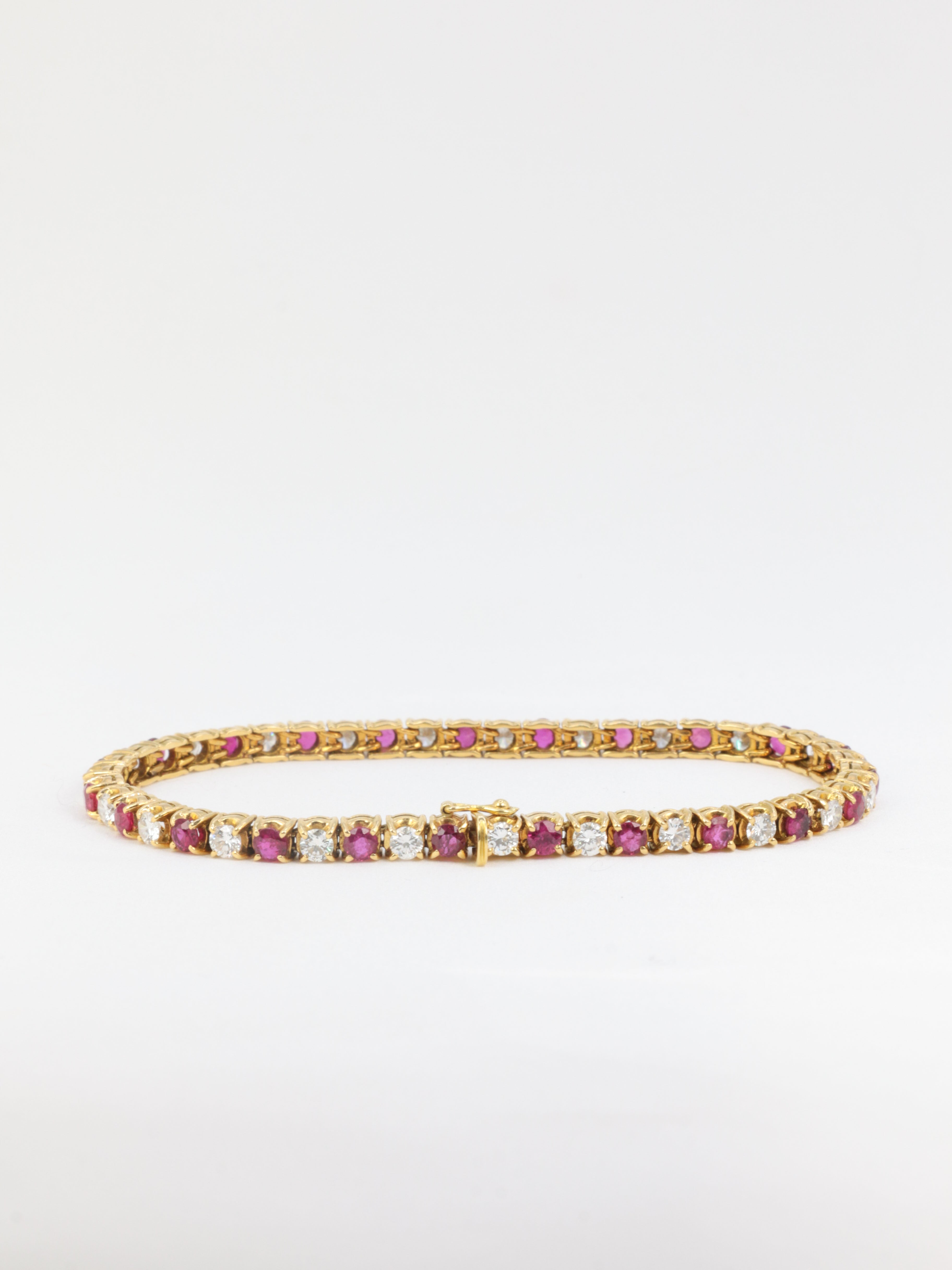 Bracelet tennis vintage en or, rubis et diamants