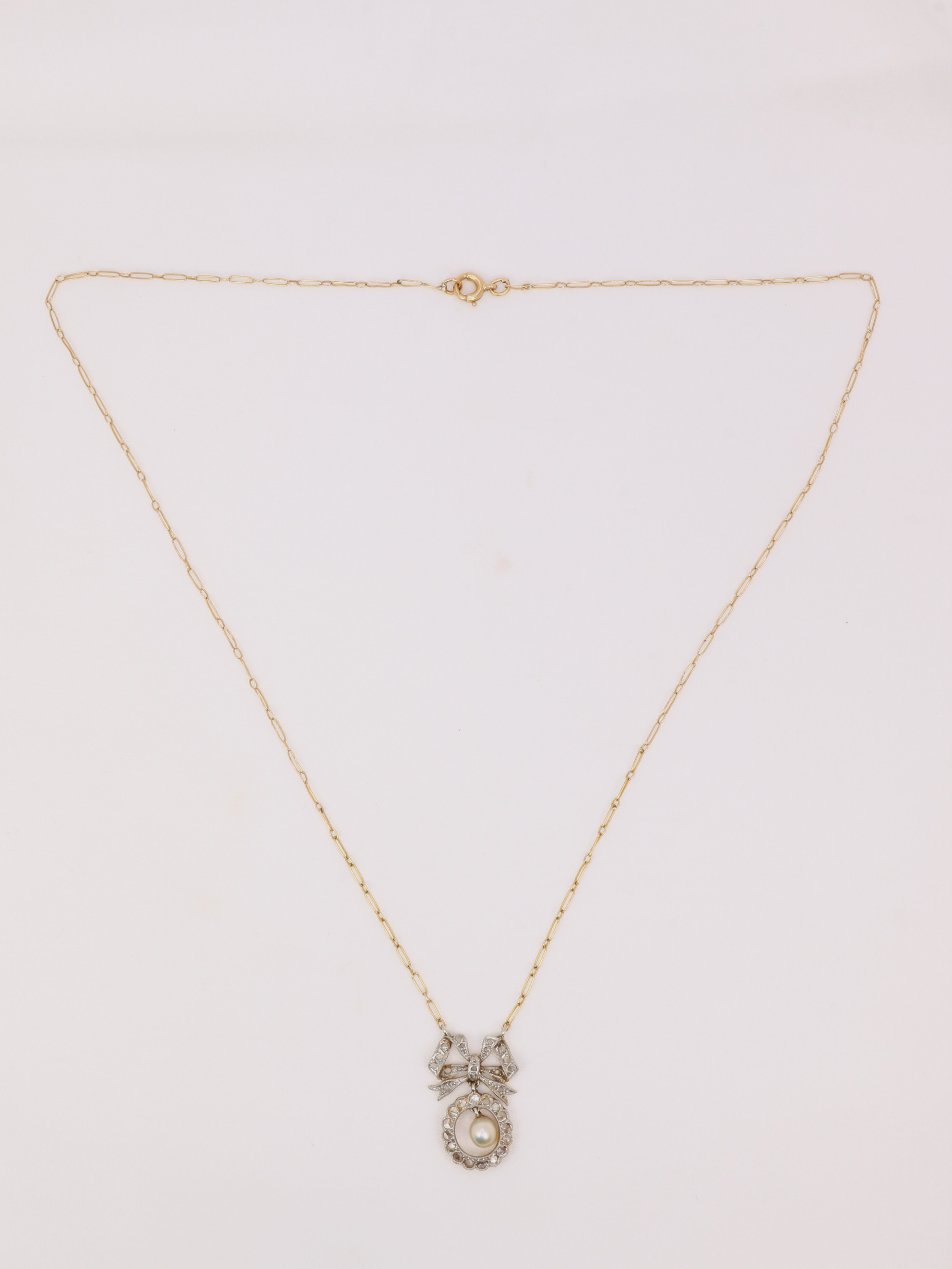 Collier noeud Belle Epoque or diamants perle fine