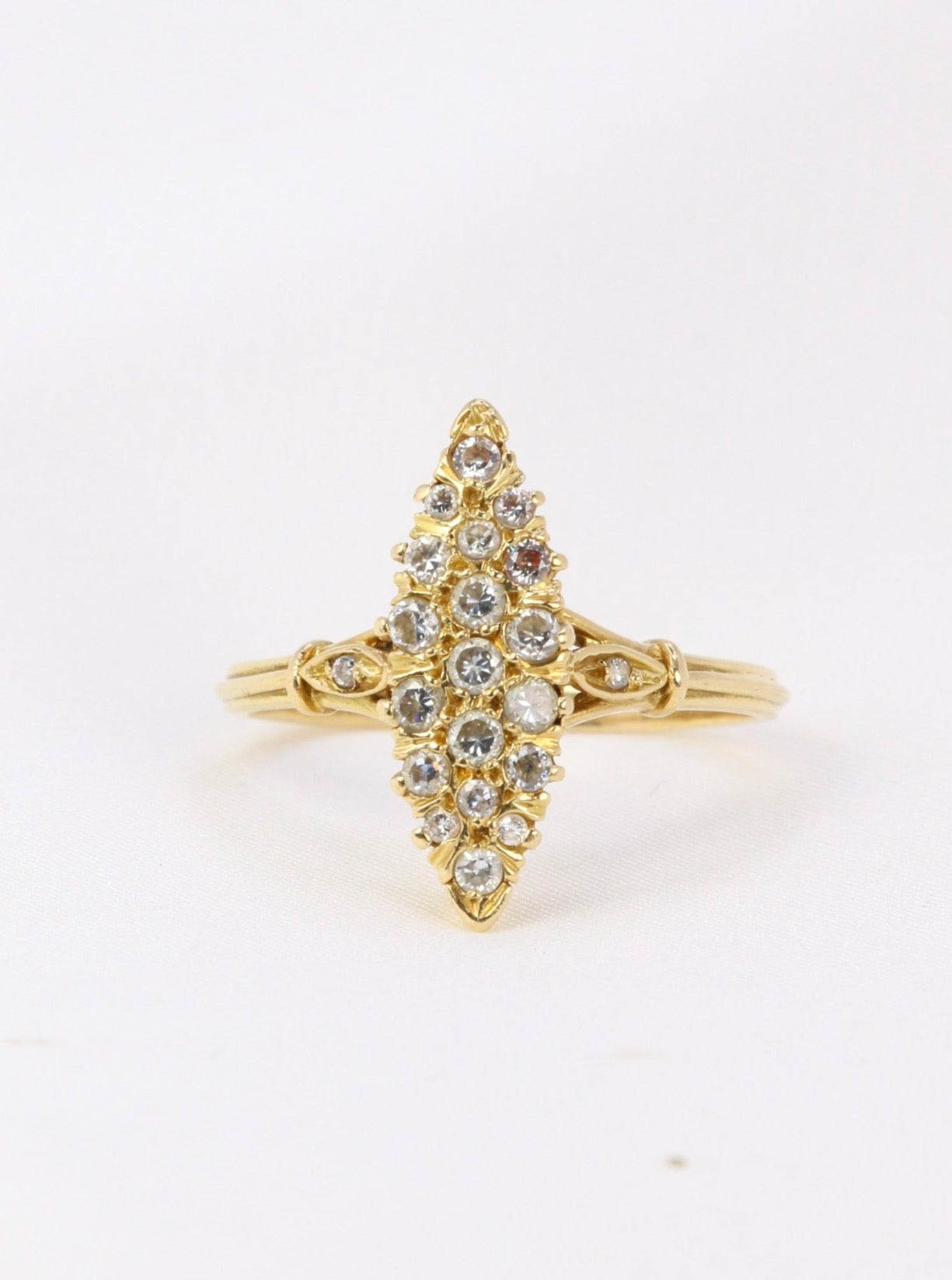 Vintage gold marquise ring paved with diamonds