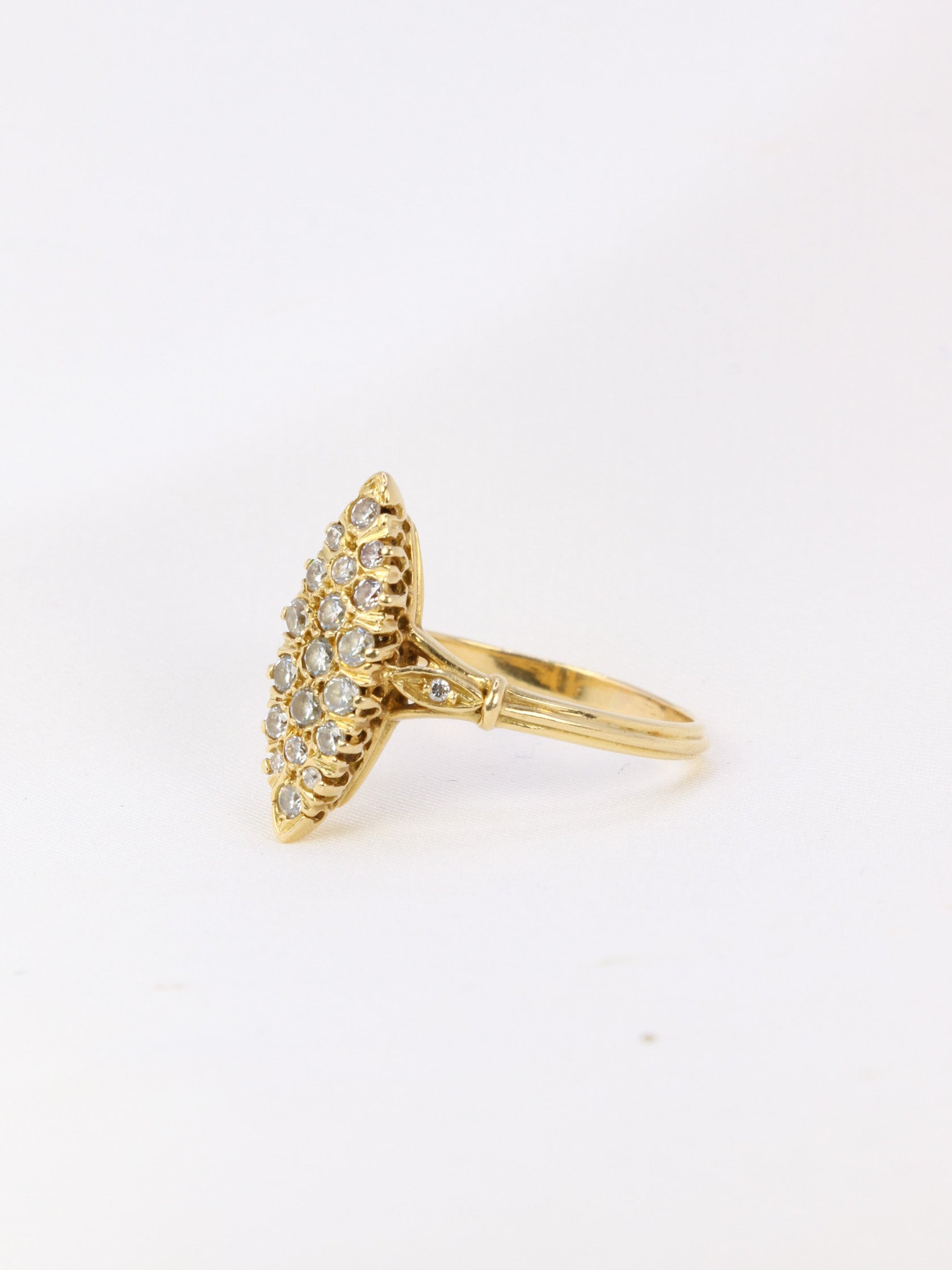 Vintage gold marquise ring paved with diamonds