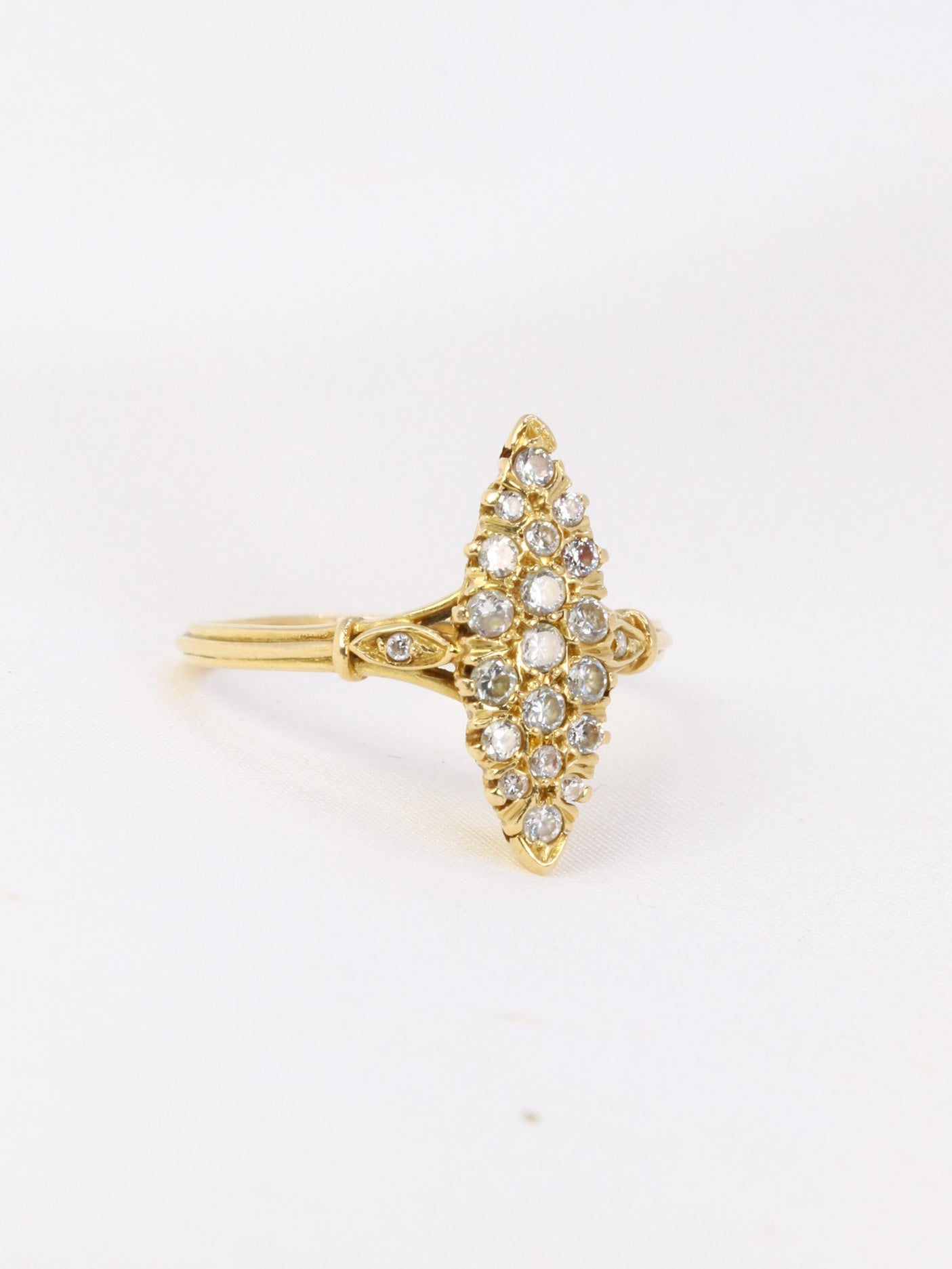 Vintage gold marquise ring paved with diamonds