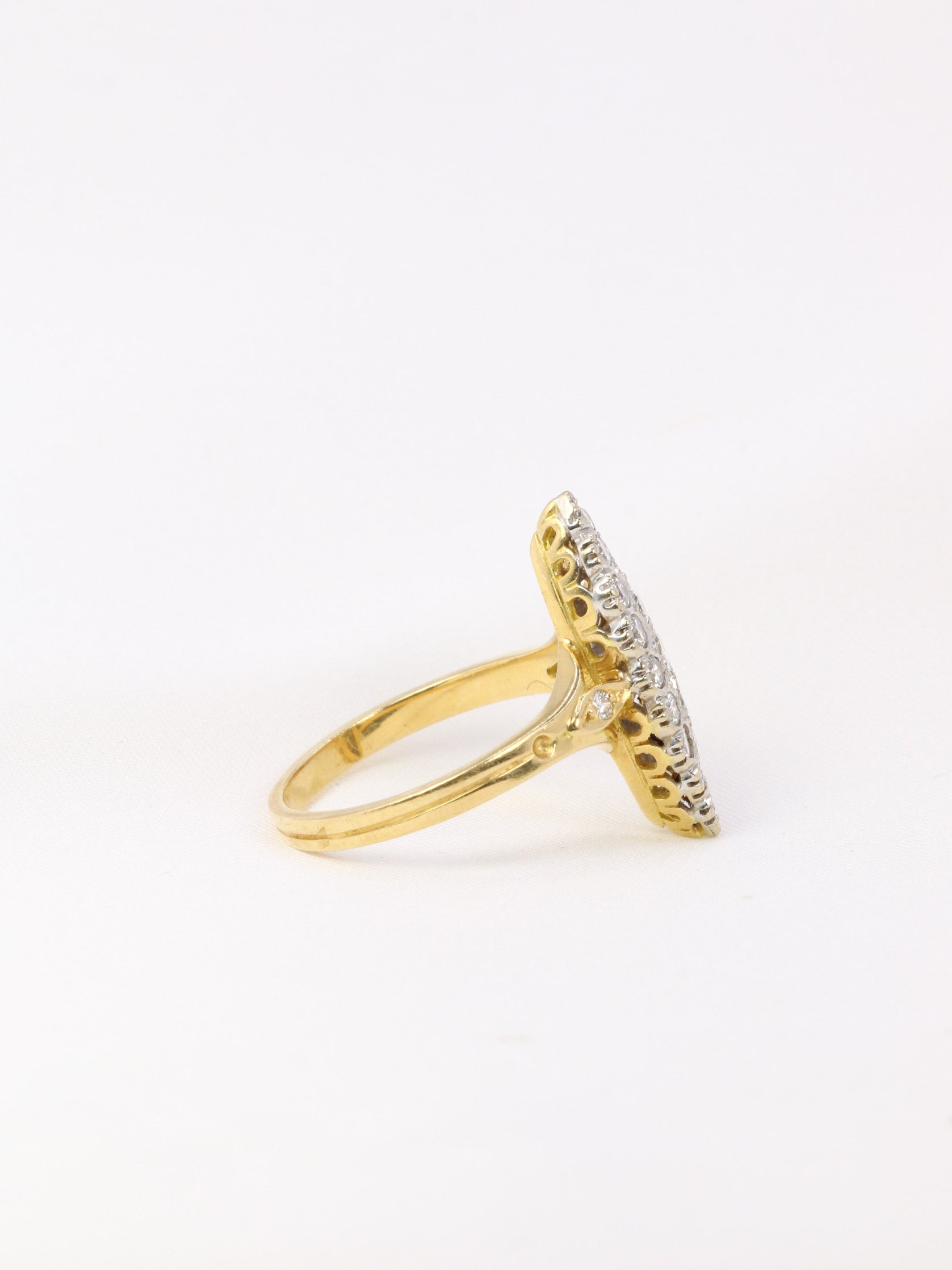 Vintage marquise ring in yellow gold and diamonds