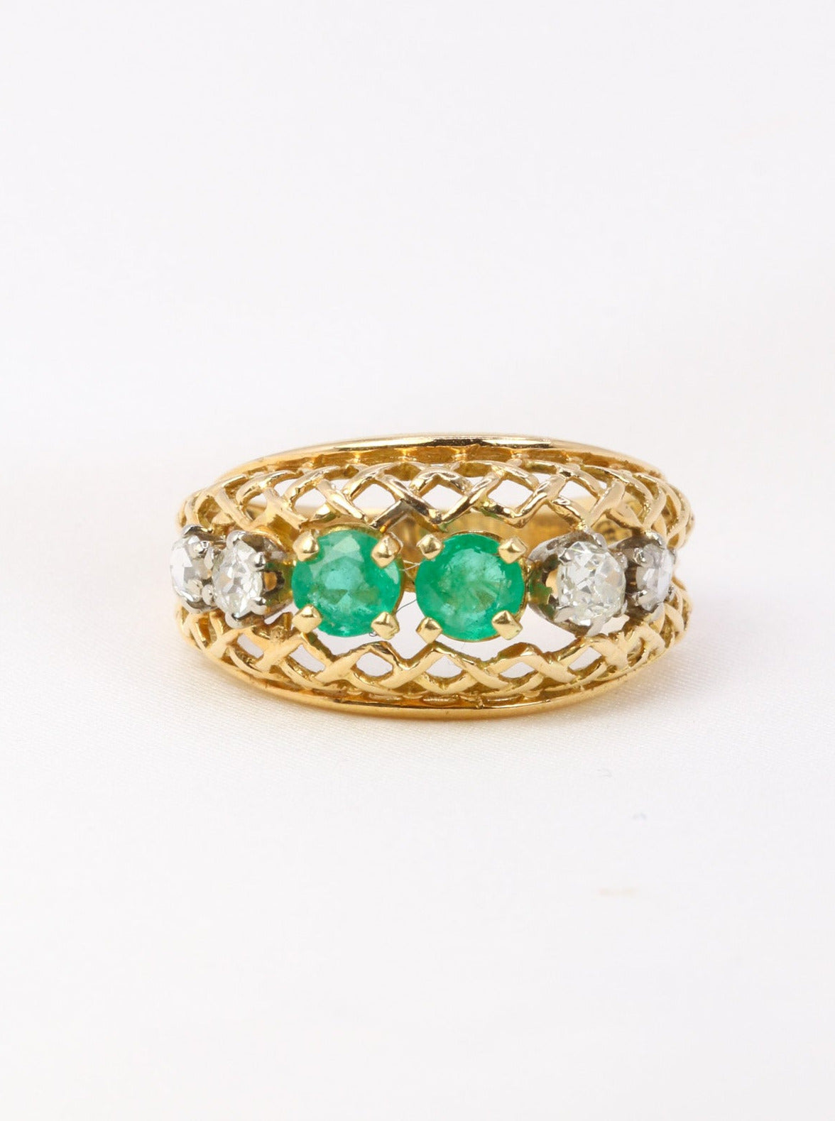 Vintage garter ring in gold, emeralds and diamonds