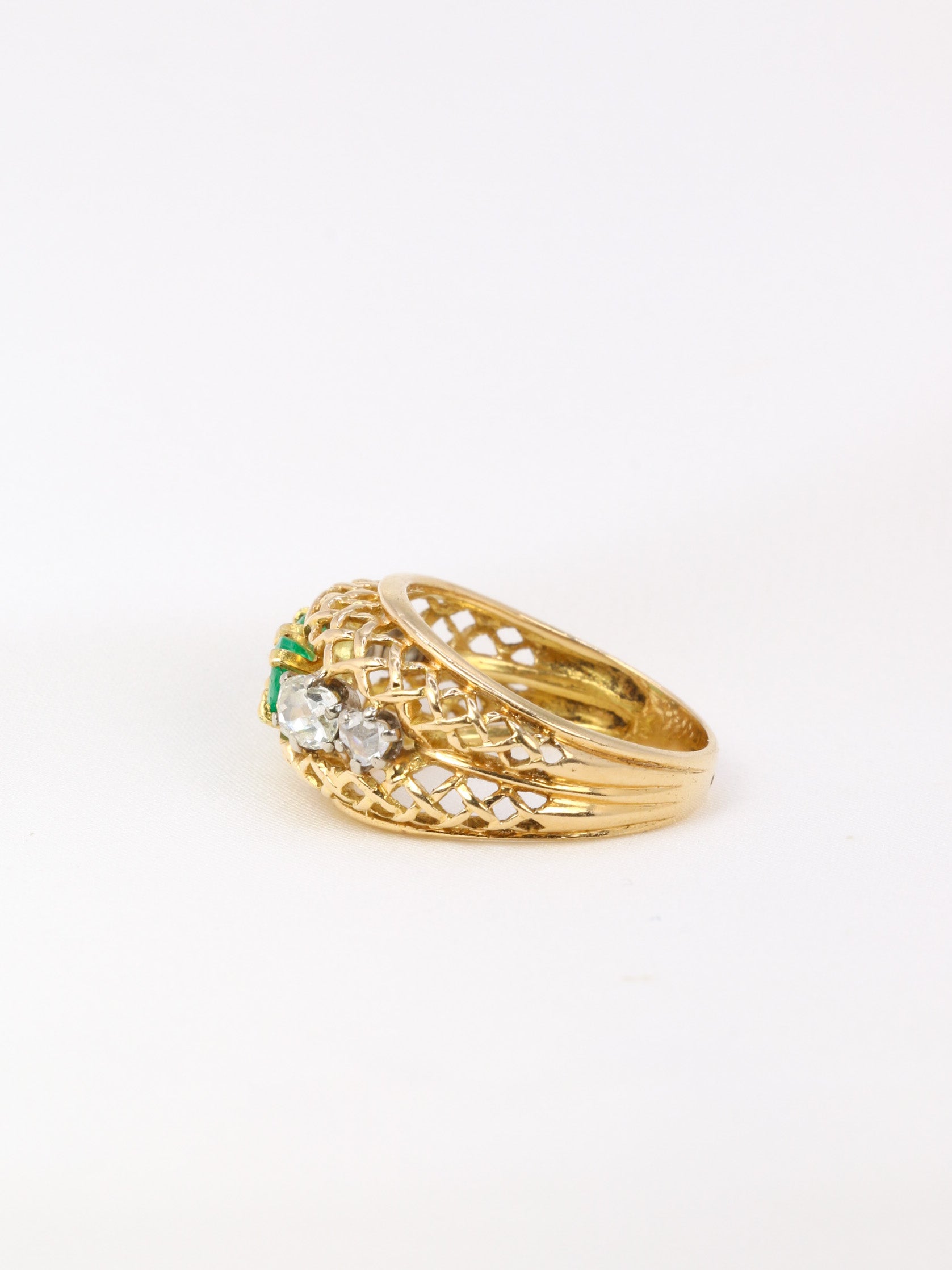 Vintage garter ring in gold, emeralds and diamonds