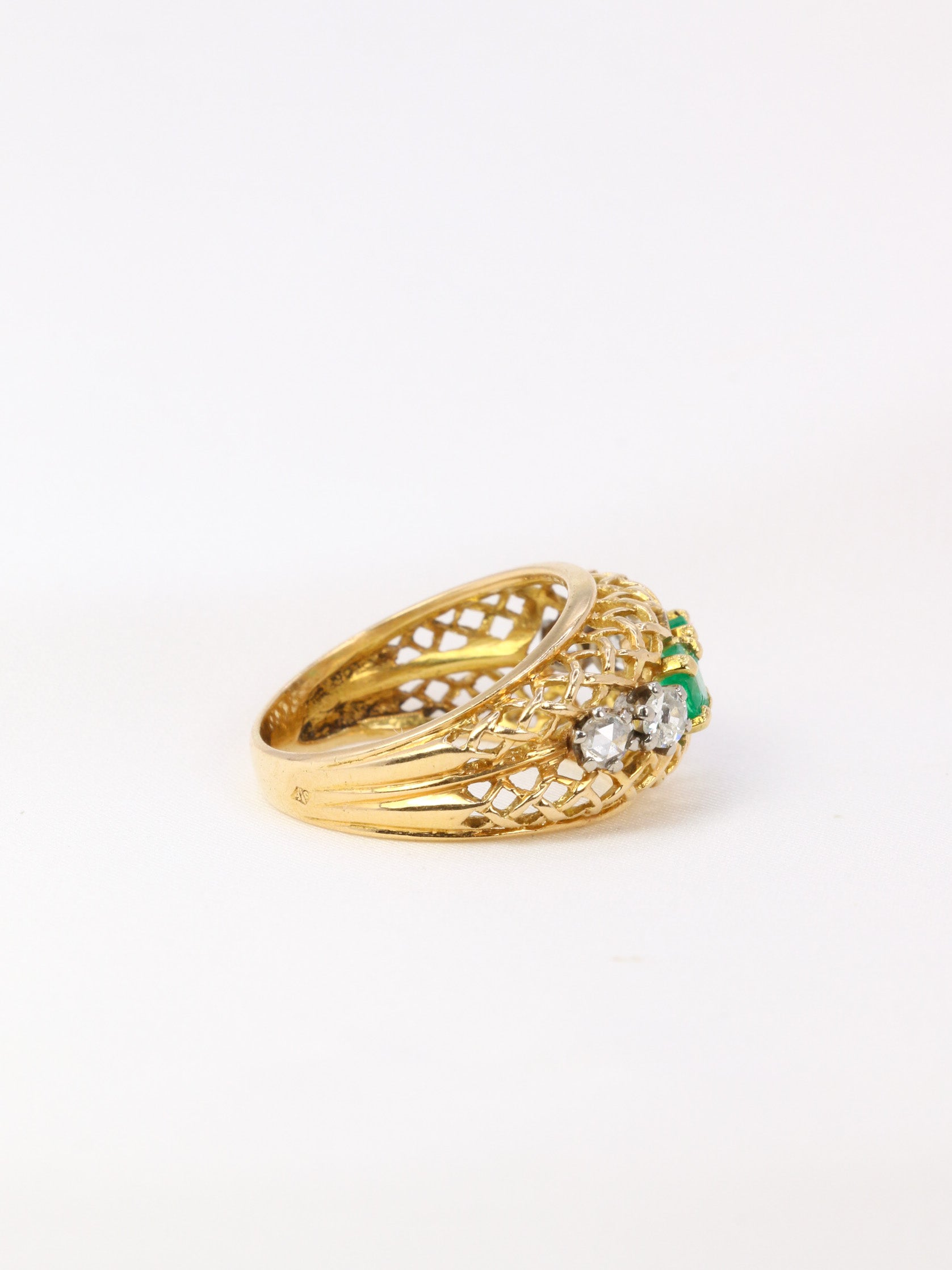 Vintage garter ring in gold, emeralds and diamonds