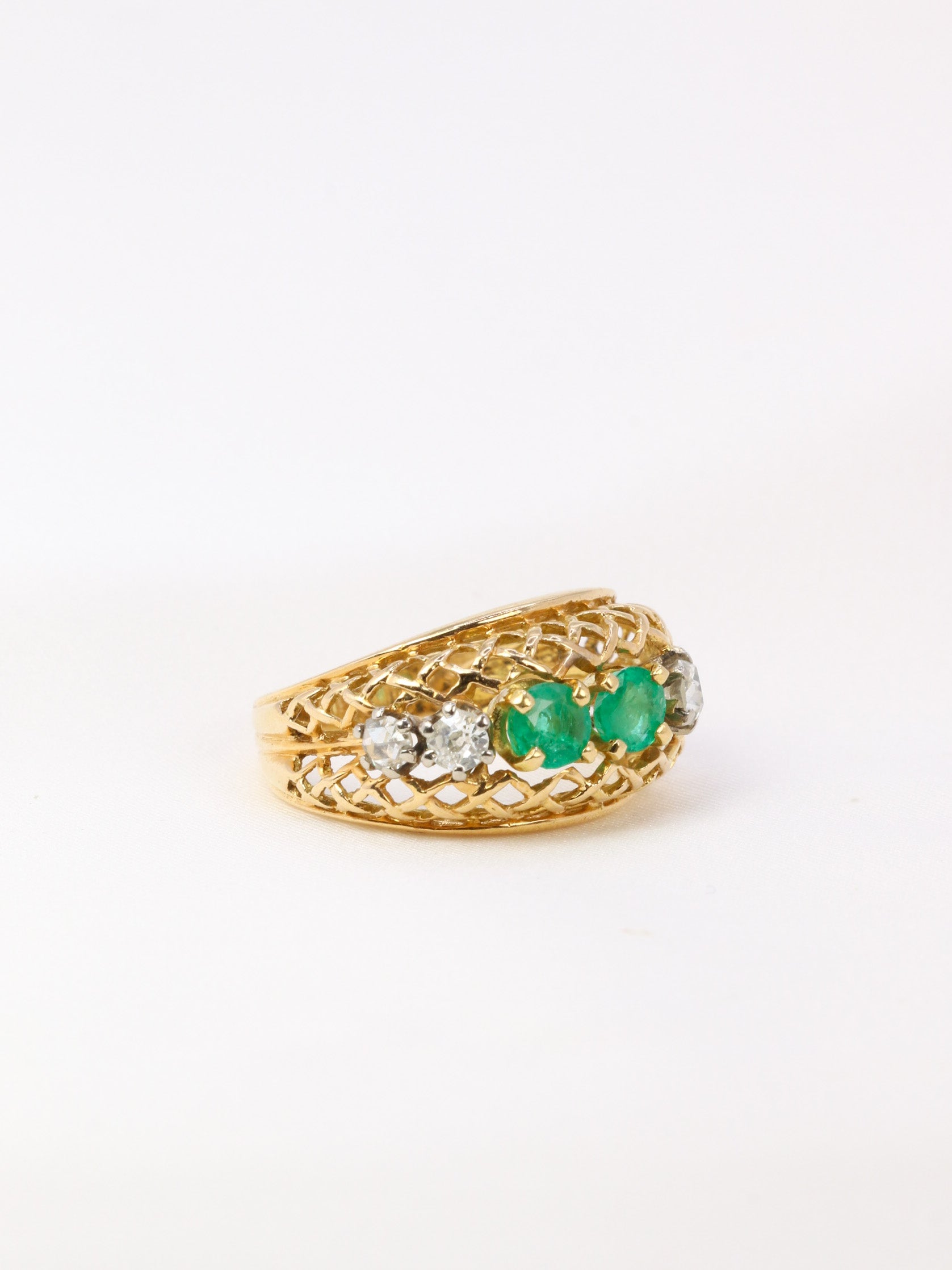 Vintage garter ring in gold, emeralds and diamonds