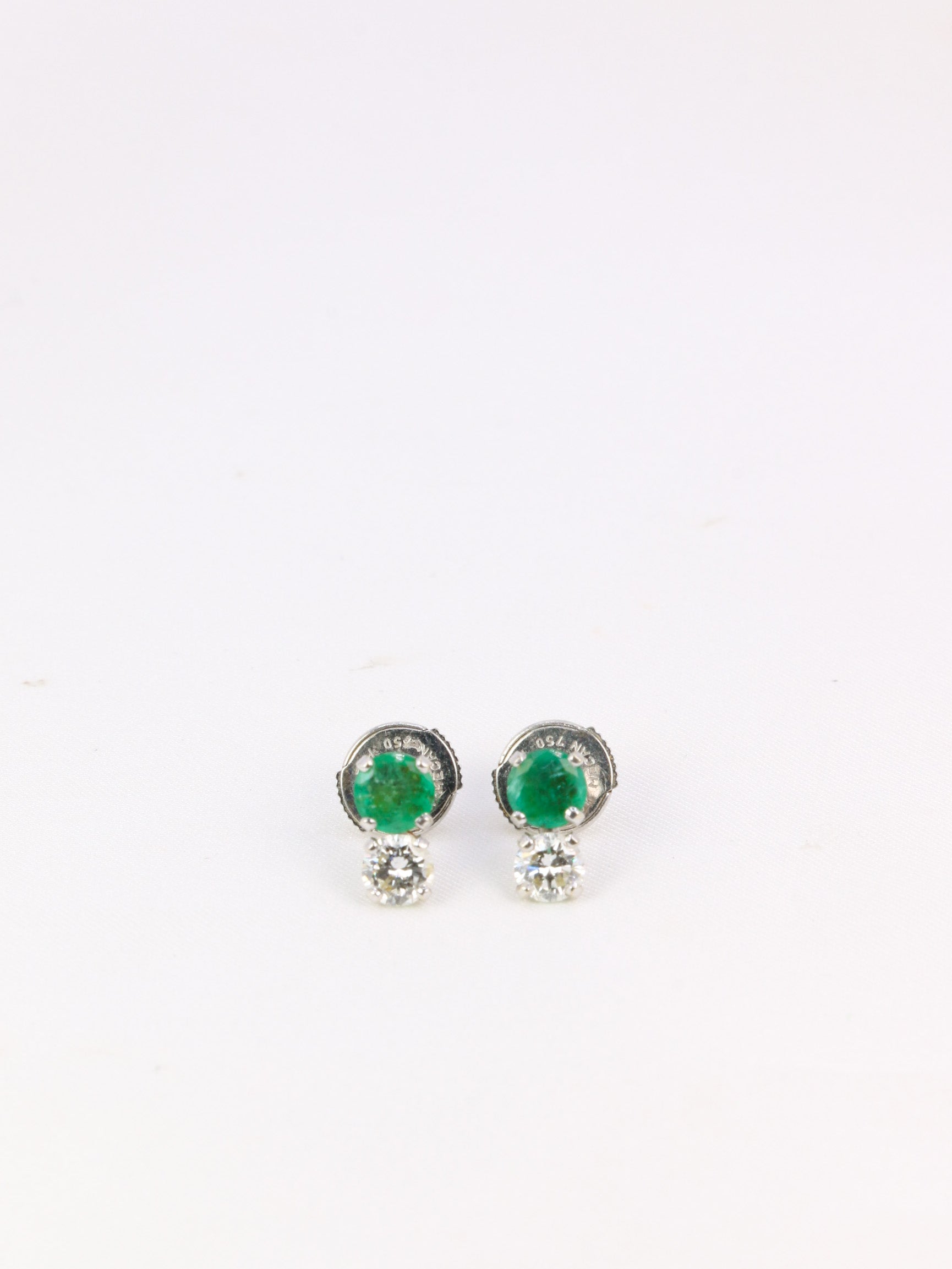 Pair of vintage earrings in white gold, diamonds and emeralds