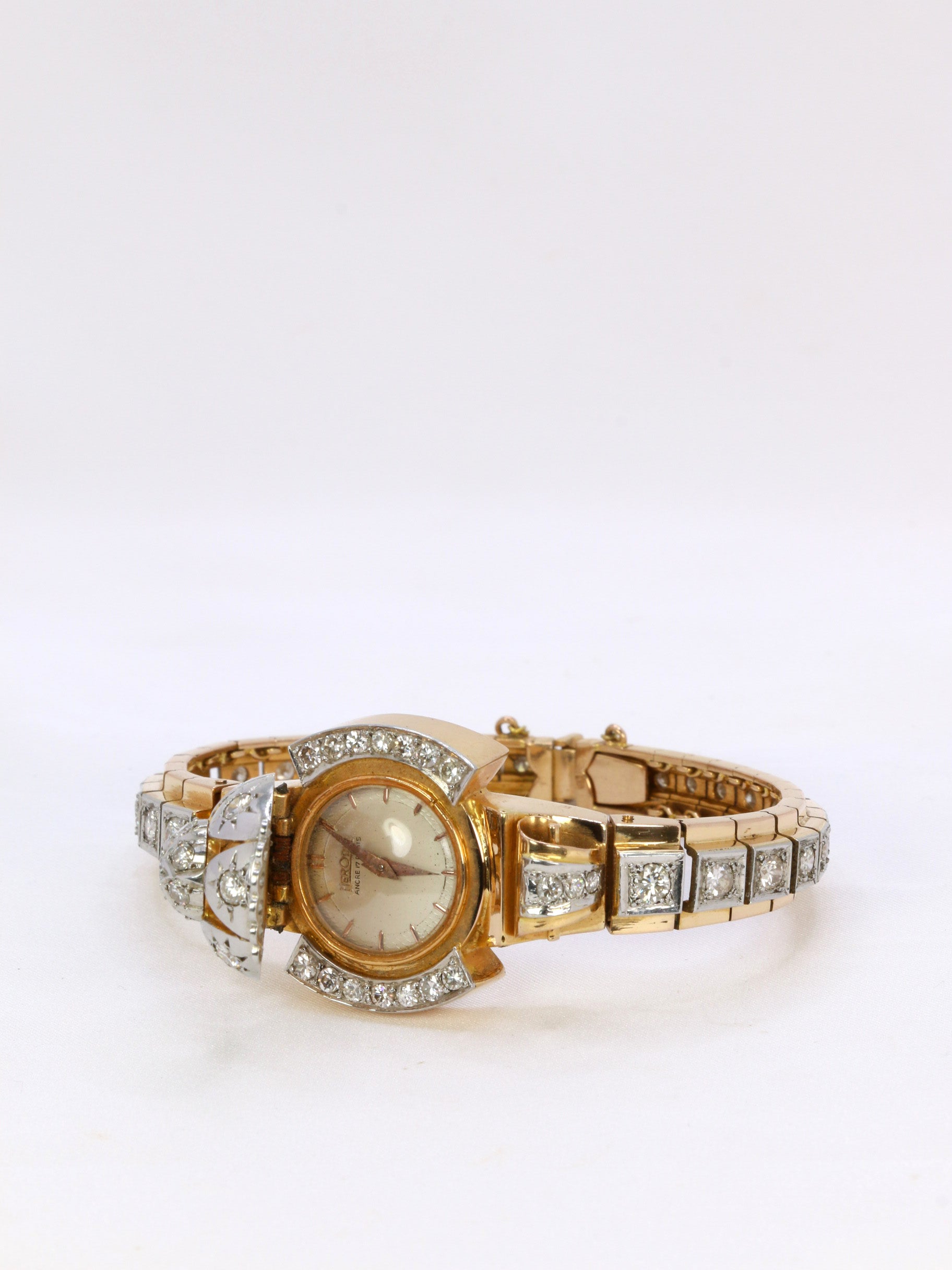 Vintage watch bracelet in yellow gold and diamonds, 1950