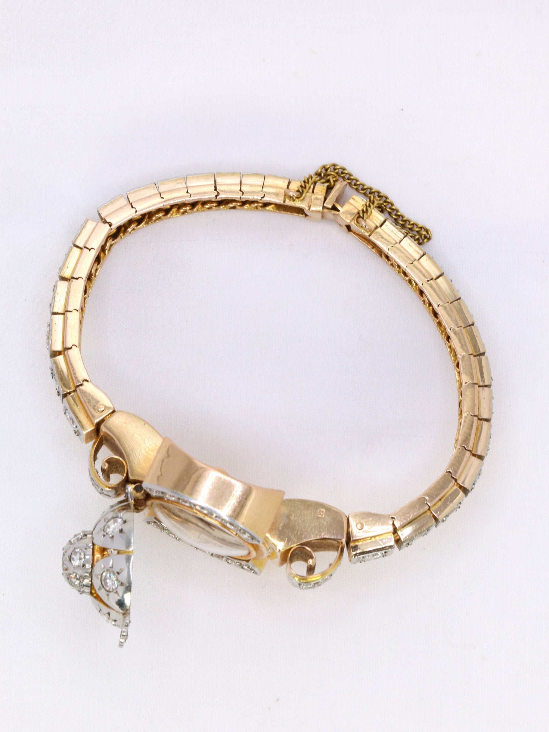 Vintage watch bracelet in yellow gold and diamonds, 1950