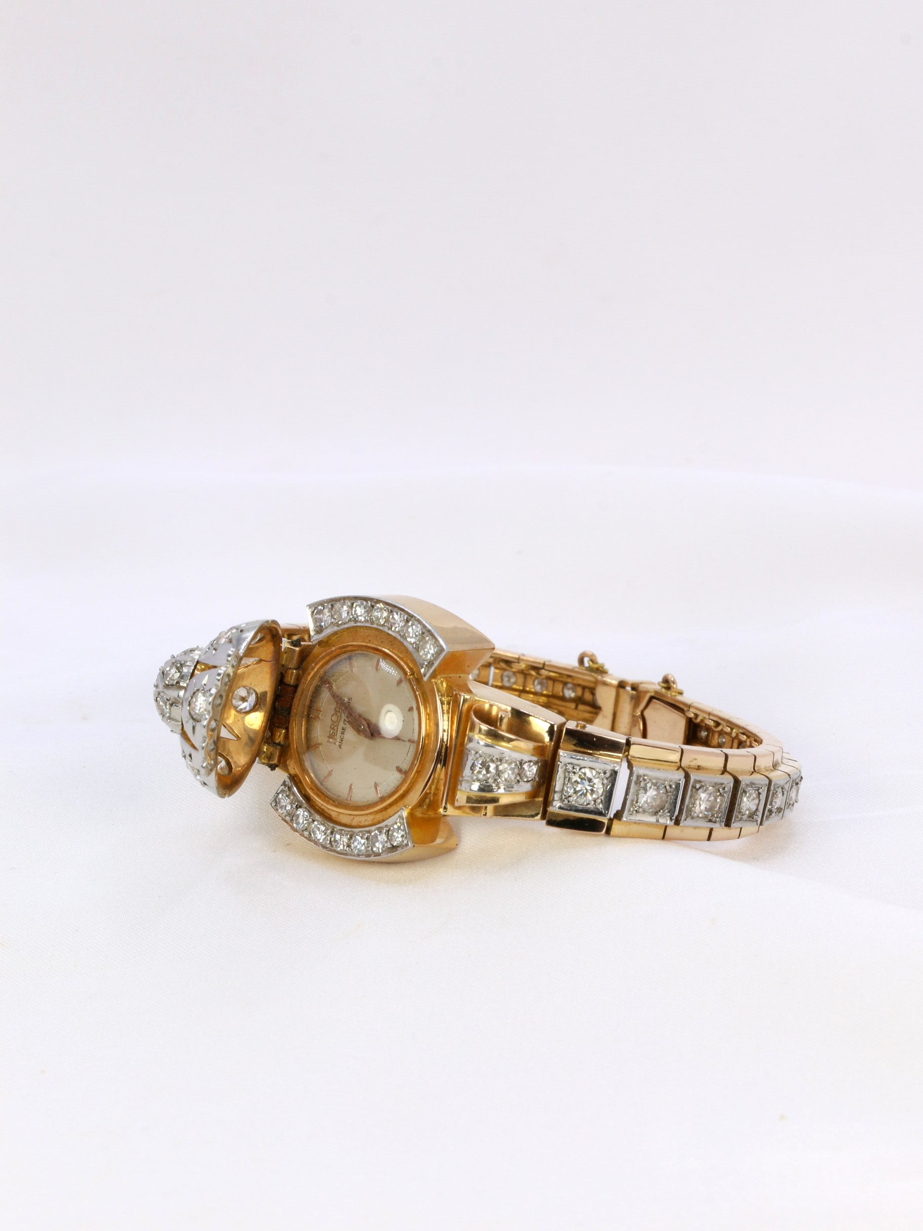 Vintage watch bracelet in yellow gold and diamonds, 1950