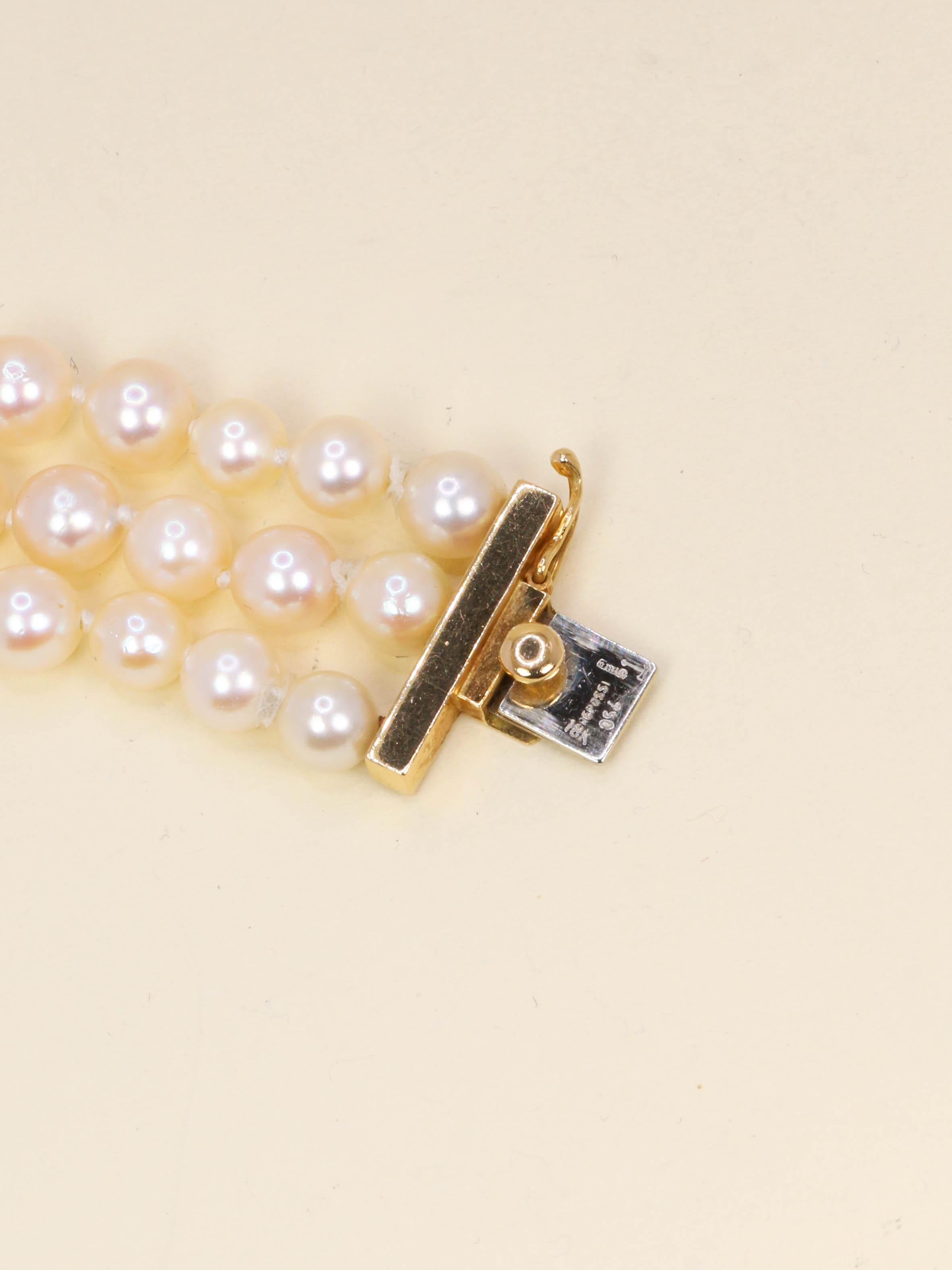 Parure REPOSSI collier de perles et clips saphirs émeraudes diamants