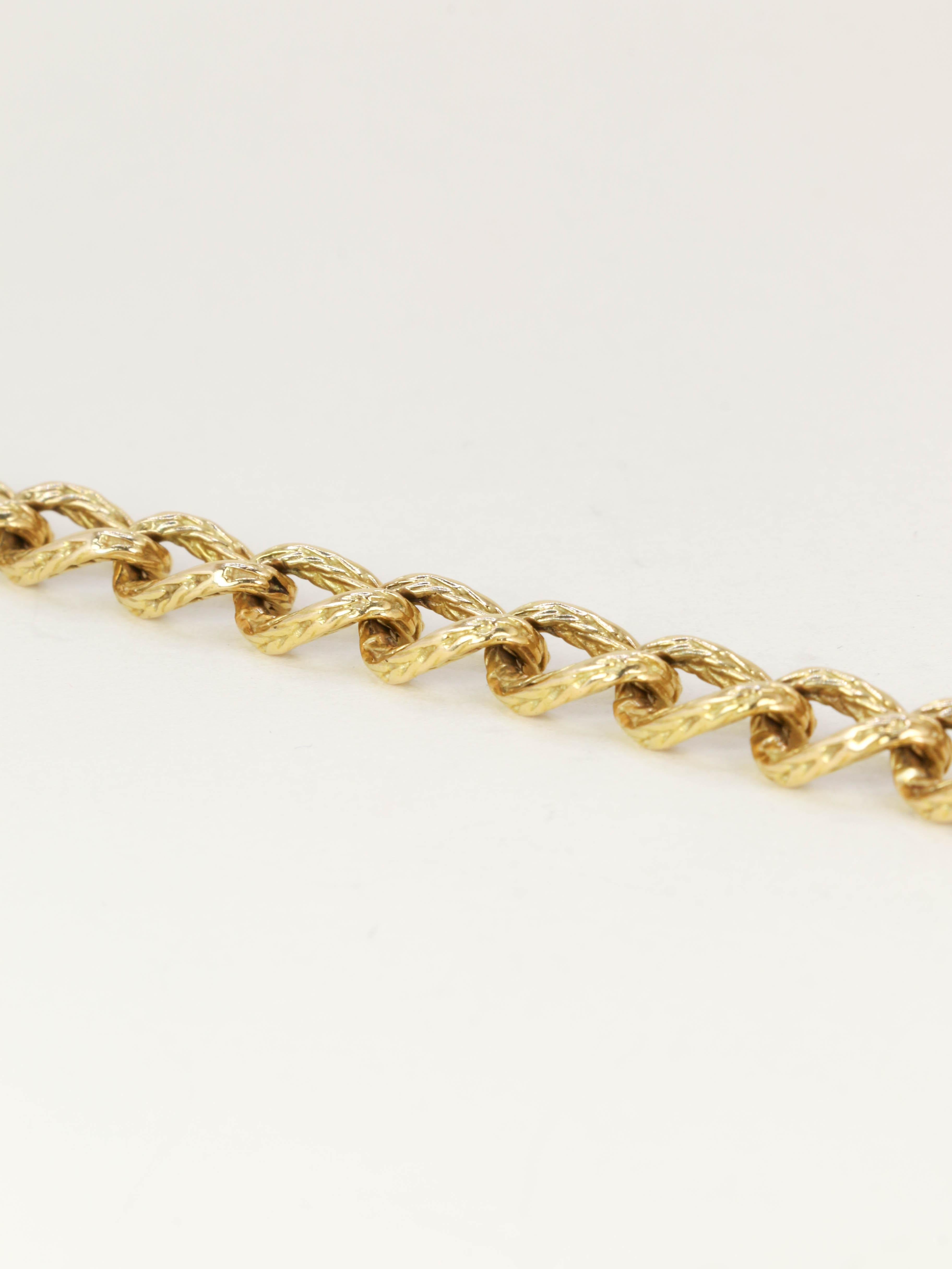 ROLLANG & Cie Bracelet chaîne maillons ovales or jaune - Années 1970