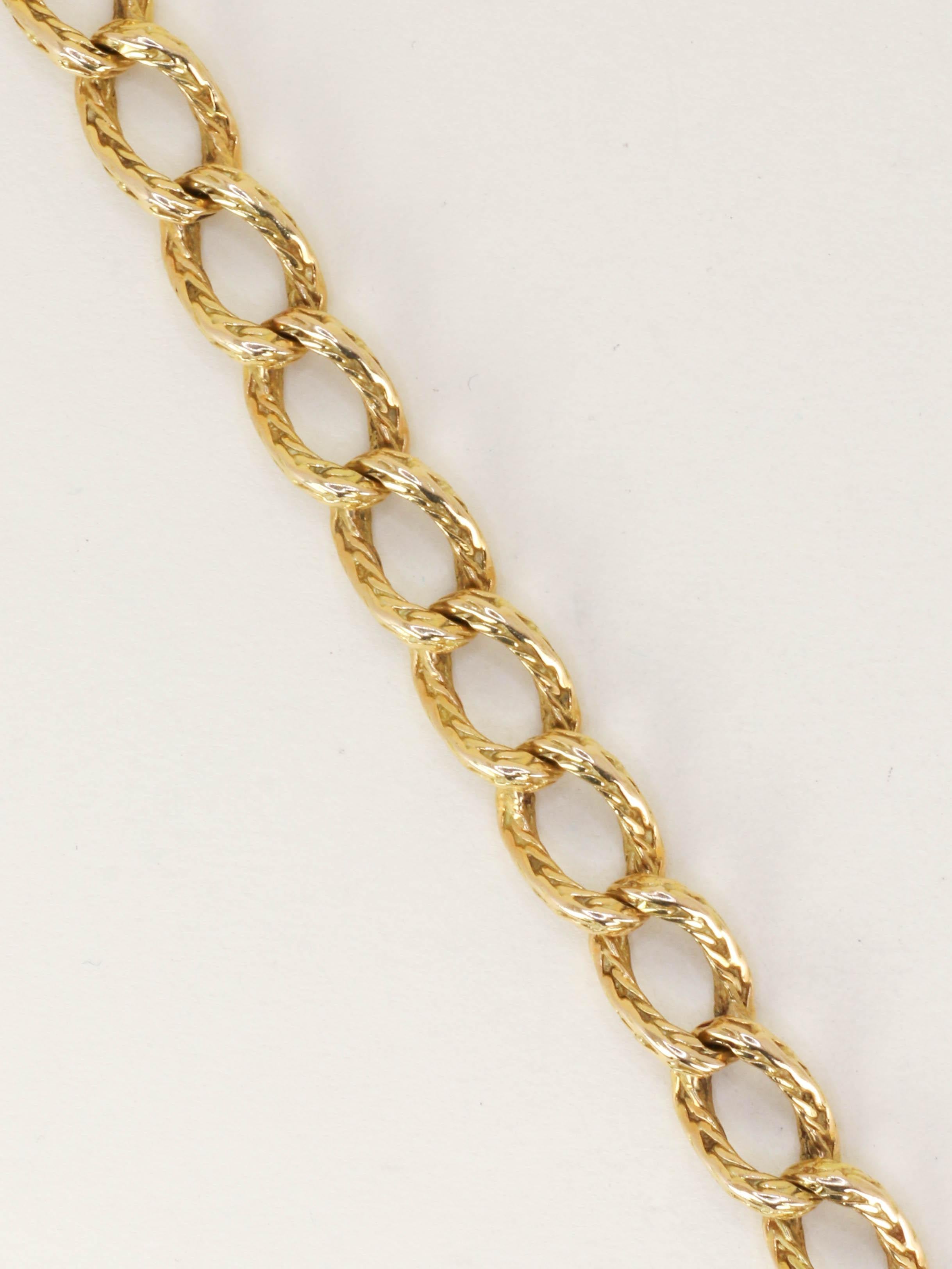 ROLLANG & Cie Bracelet chaîne maillons ovales or jaune - Années 1970