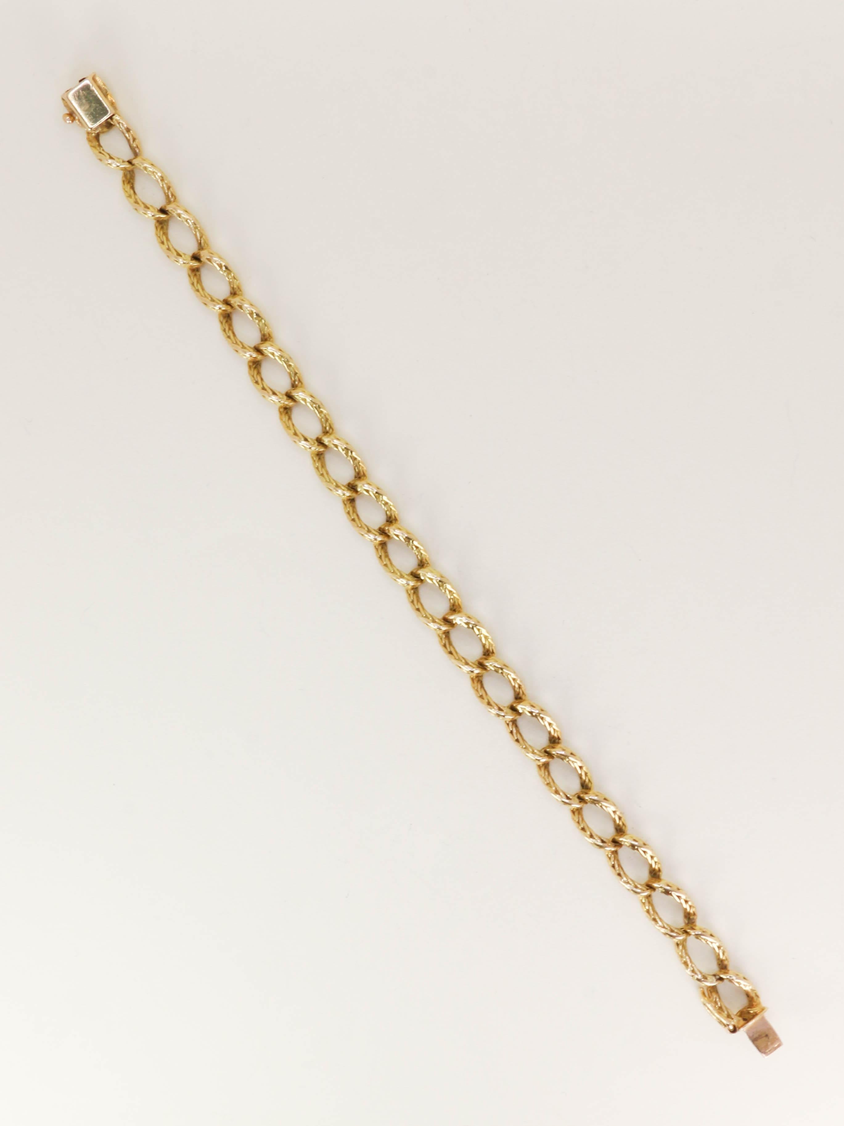 ROLLANG & Cie Bracelet chaîne maillons ovales or jaune - Années 1970