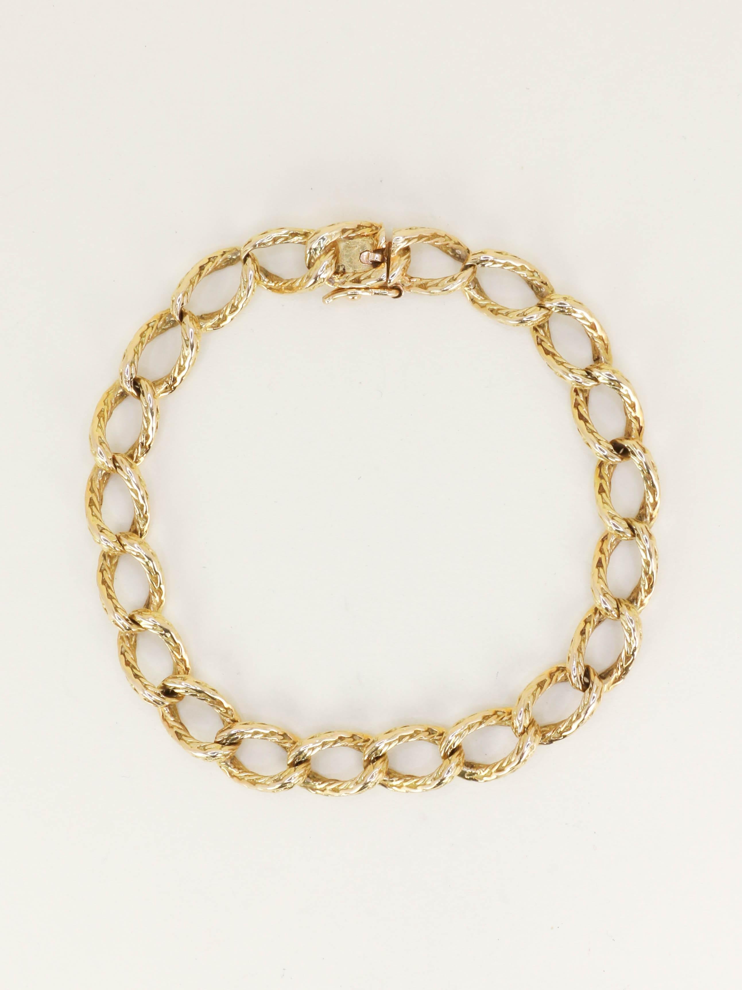 ROLLANG & Cie Bracelet chaîne maillons ovales or jaune - Années 1970