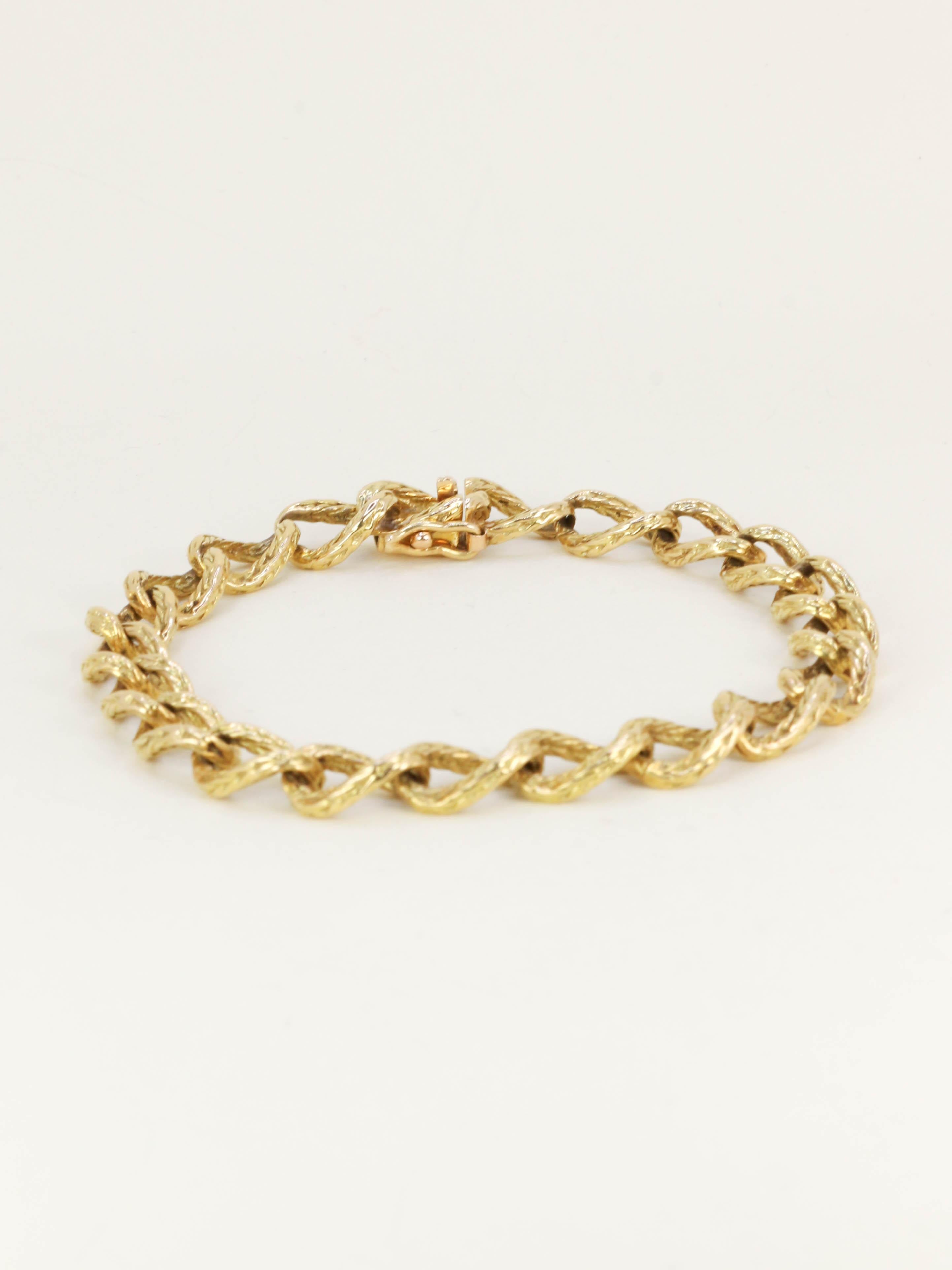 ROLLANG & Cie Bracelet chaîne maillons ovales or jaune - Années 1970