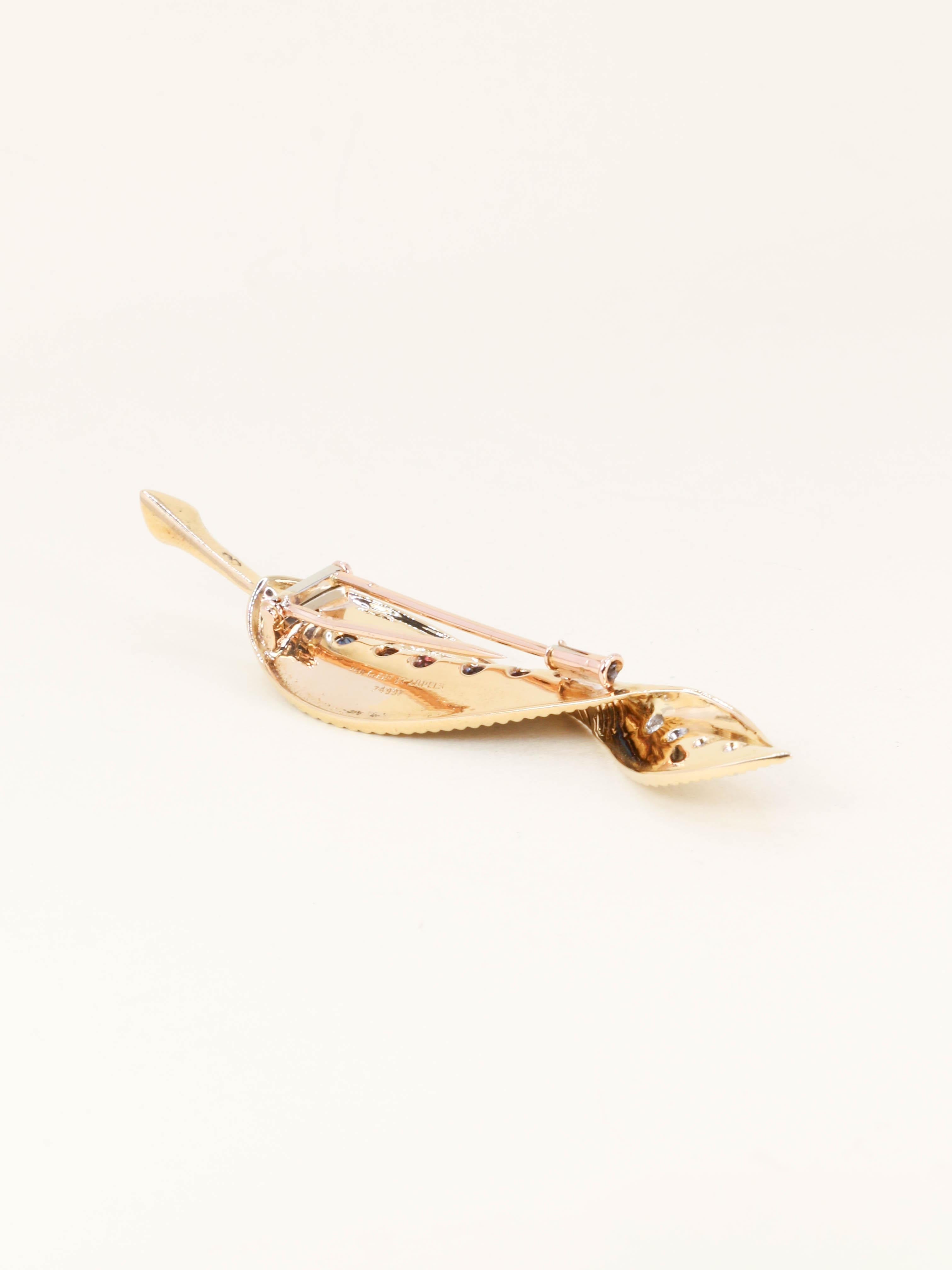 VAN CLEEF & ARPELS Broche clip feuille or jaune saphirs diamants - 1959