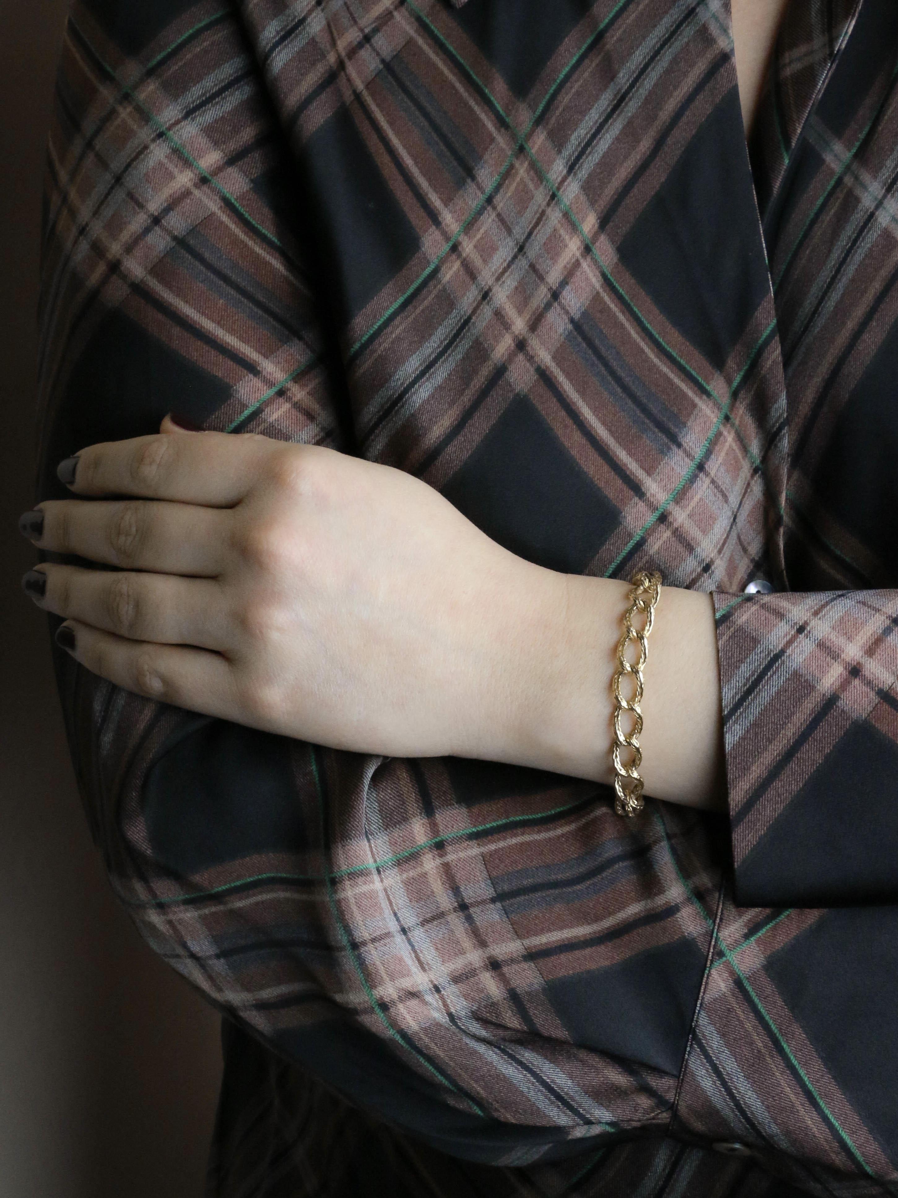 ROLLANG & Cie Bracelet chaîne maillons ovales or jaune - Années 1970