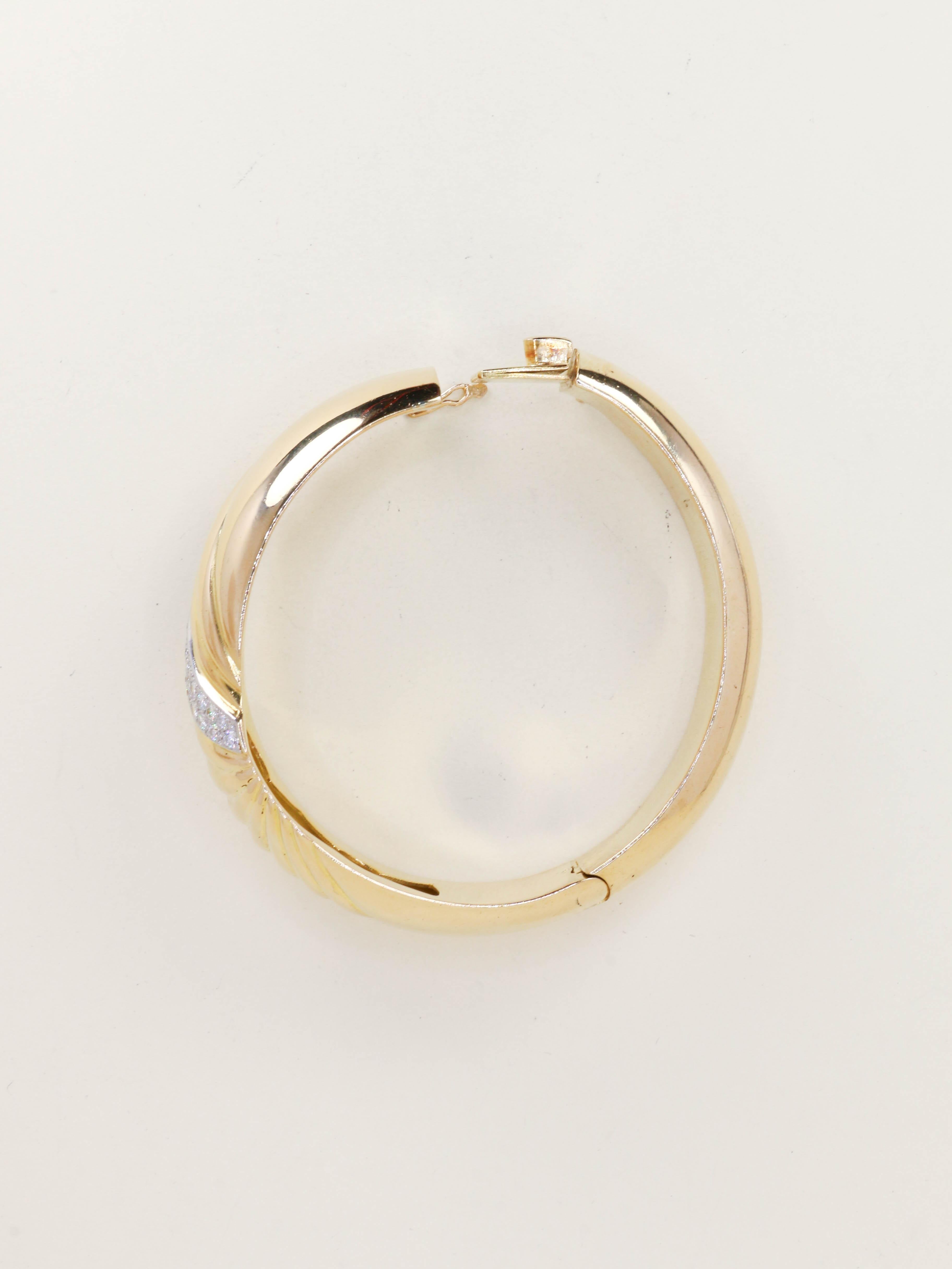 Bracelet jonc coquillage or jaune diamants années 1960