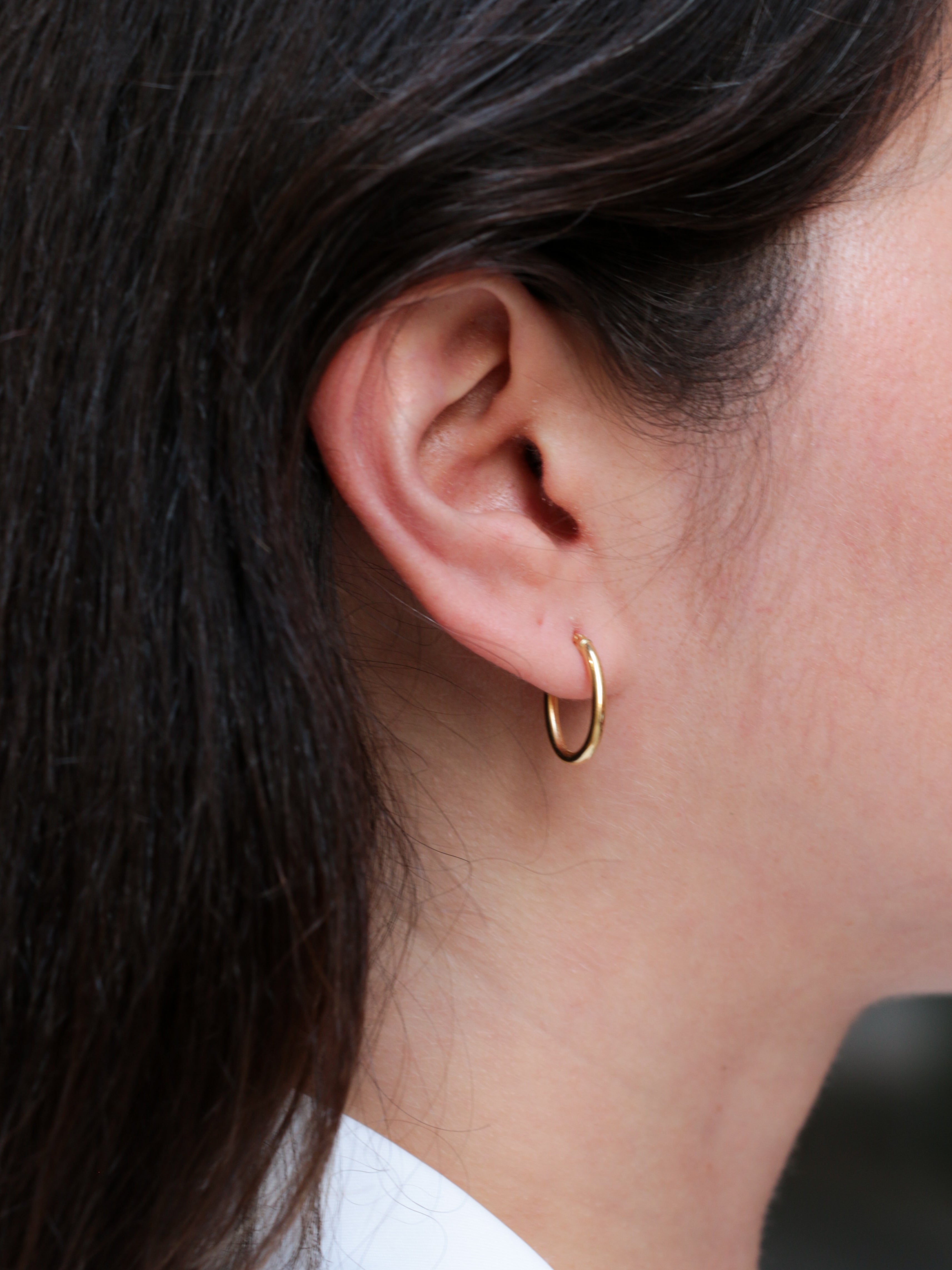 Pair of vintage oval hoop earrings in yellow gold