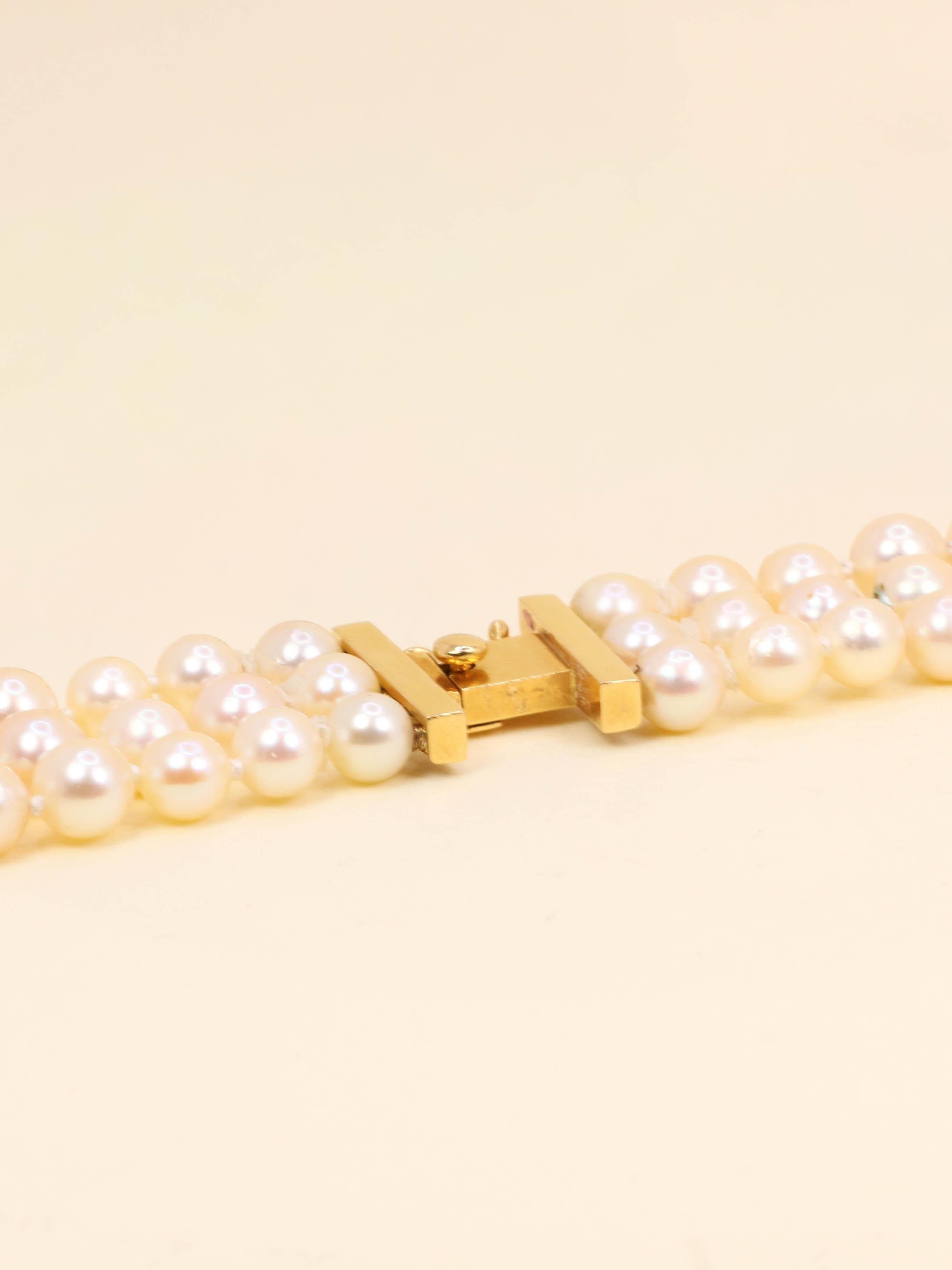 Parure REPOSSI collier de perles et clips saphirs émeraudes diamants