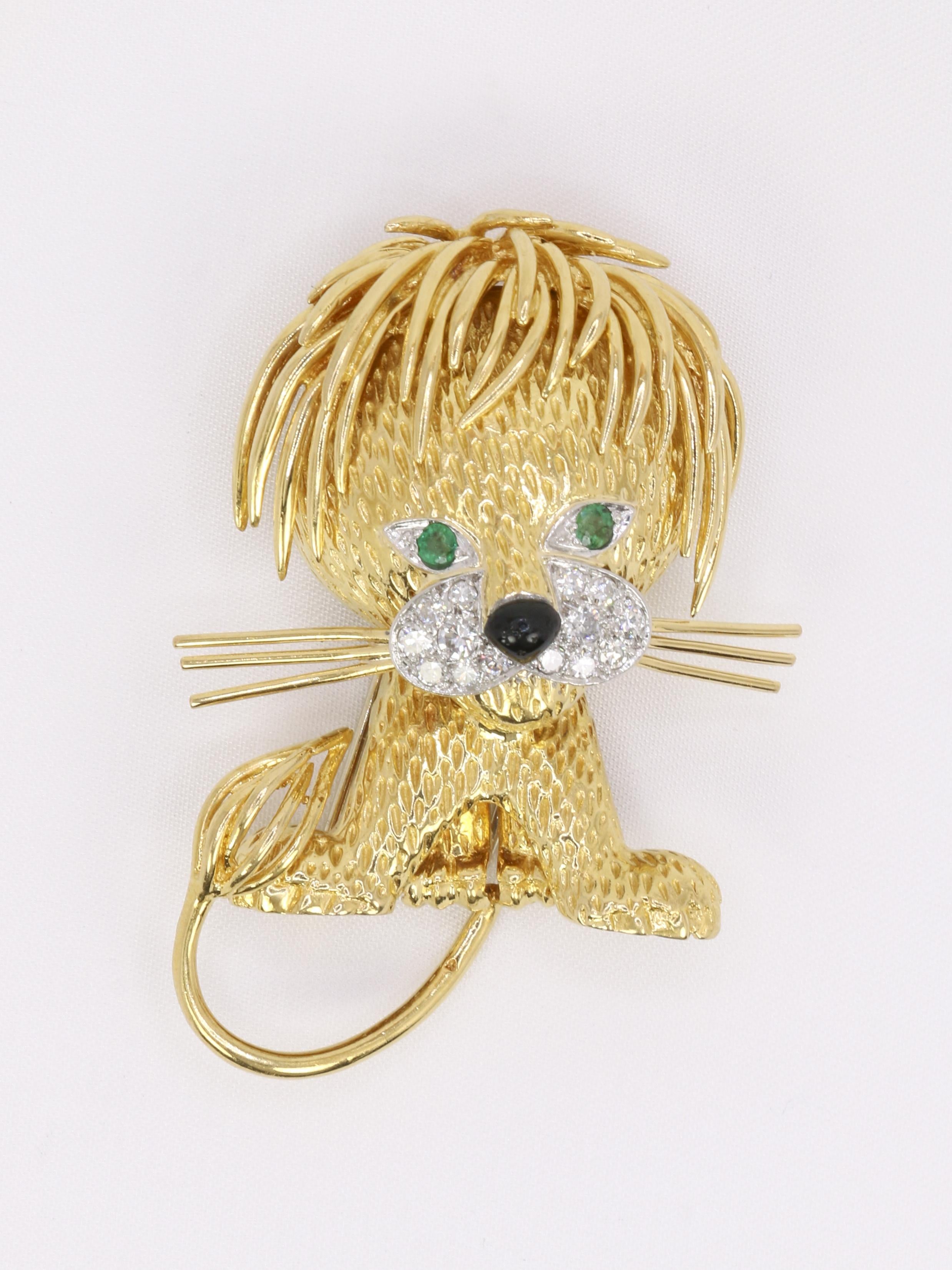 VAN CLEEF & ARPELS Broche Lion ébouriffé or diamants émeraudes