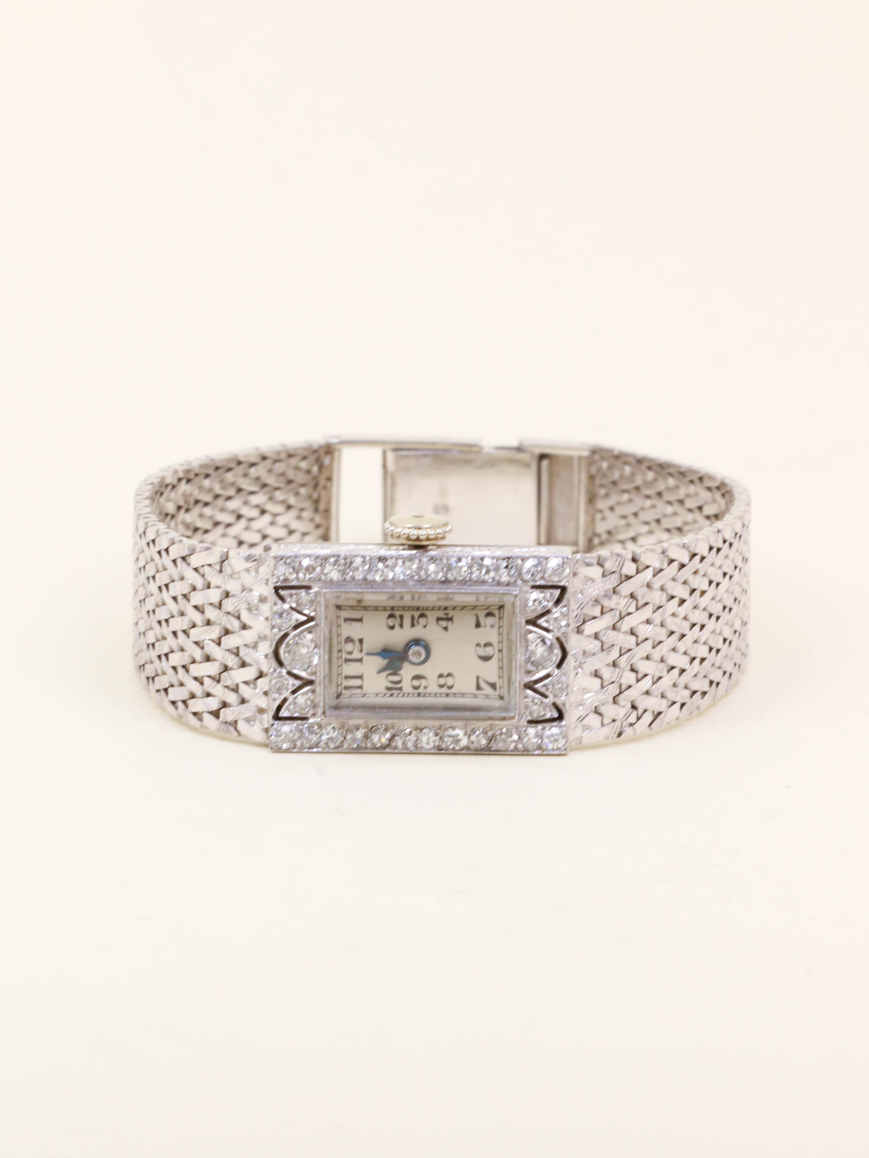 Montre Art Déco or blanc diamants