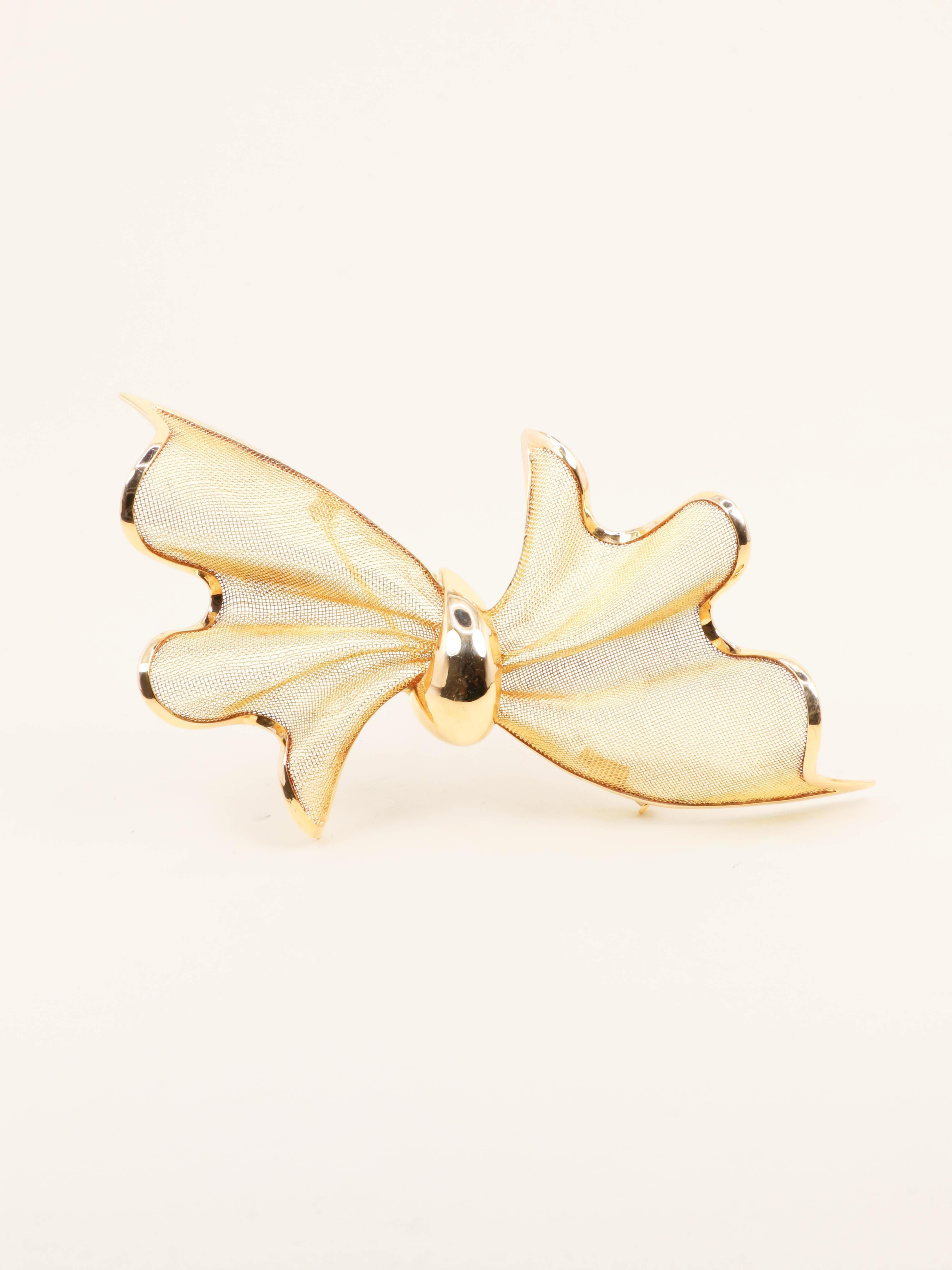 Broche nœud papillon or jaune