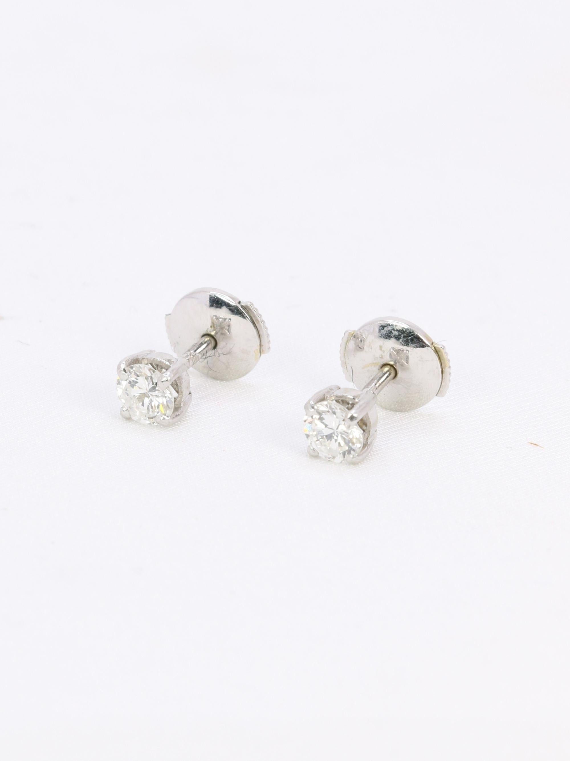Puces d'oreilles or blanc diamants ronds 0.7 carat