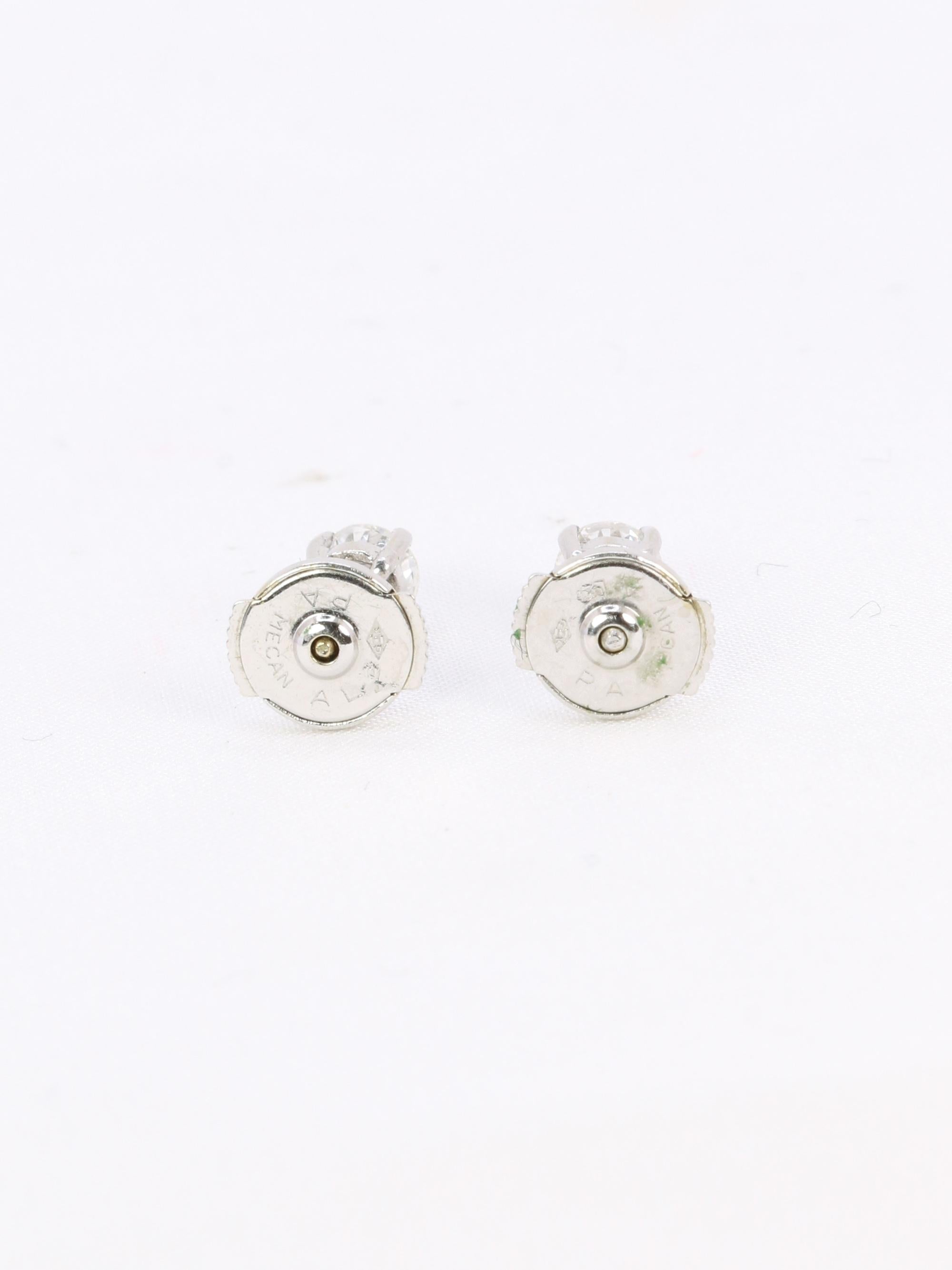 Puces d'oreilles or blanc diamants ronds 0.7 carat