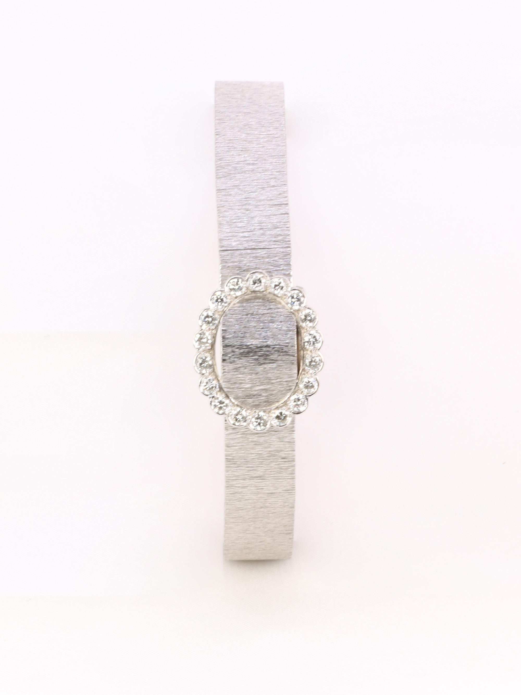 ANDRE COL Montre à secret or blanc diamants