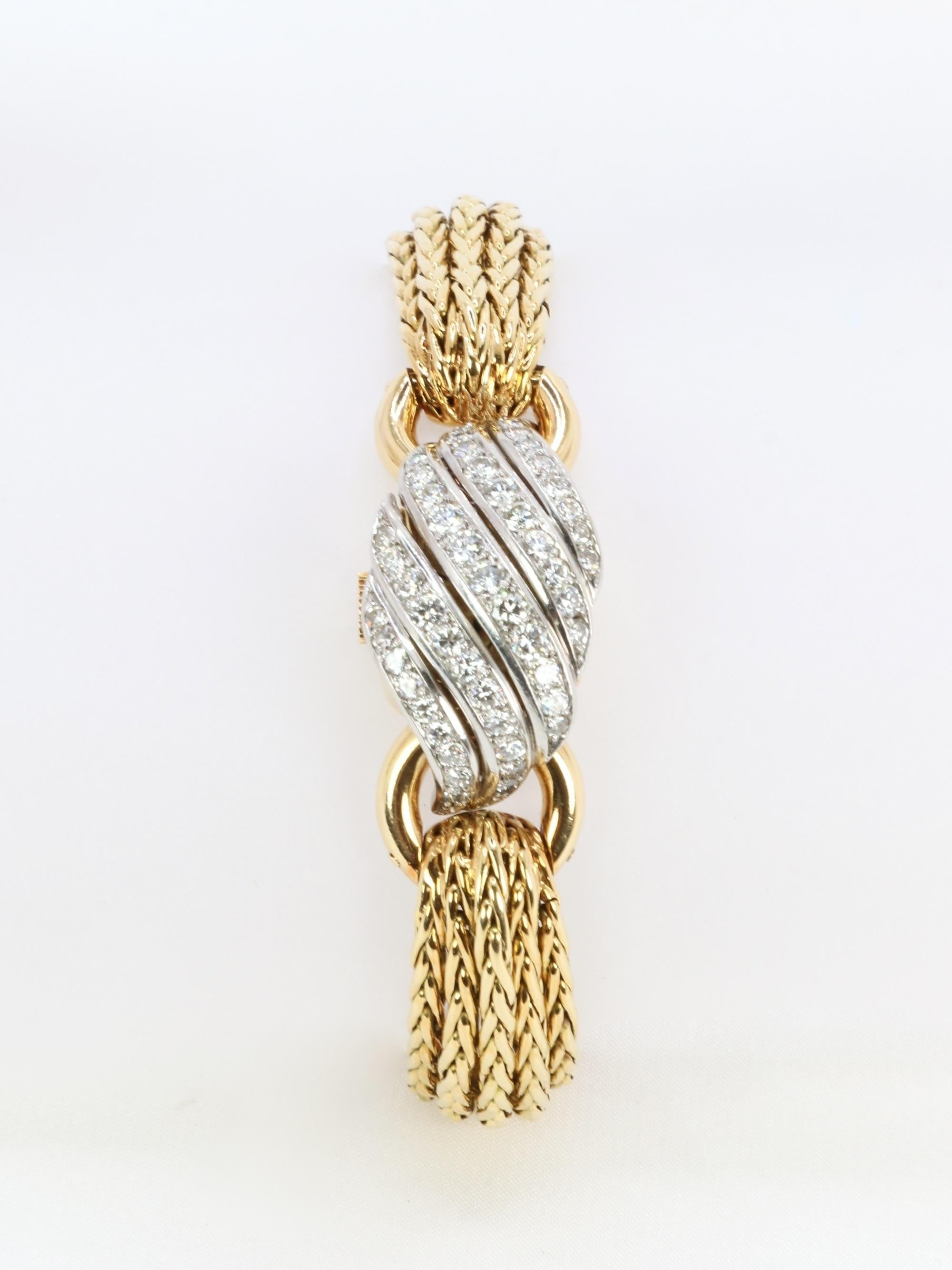 BOUCHERON Montre à secrets or jaune diamants