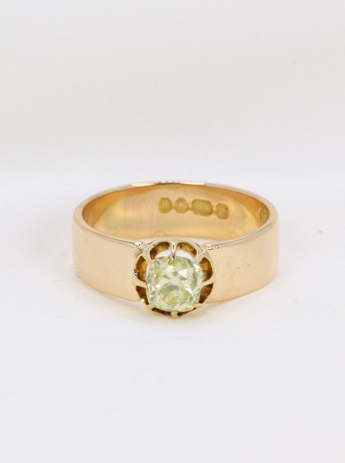 Fancy Yellow 1.1 ct old-cut cushion-cut diamond and gold ring