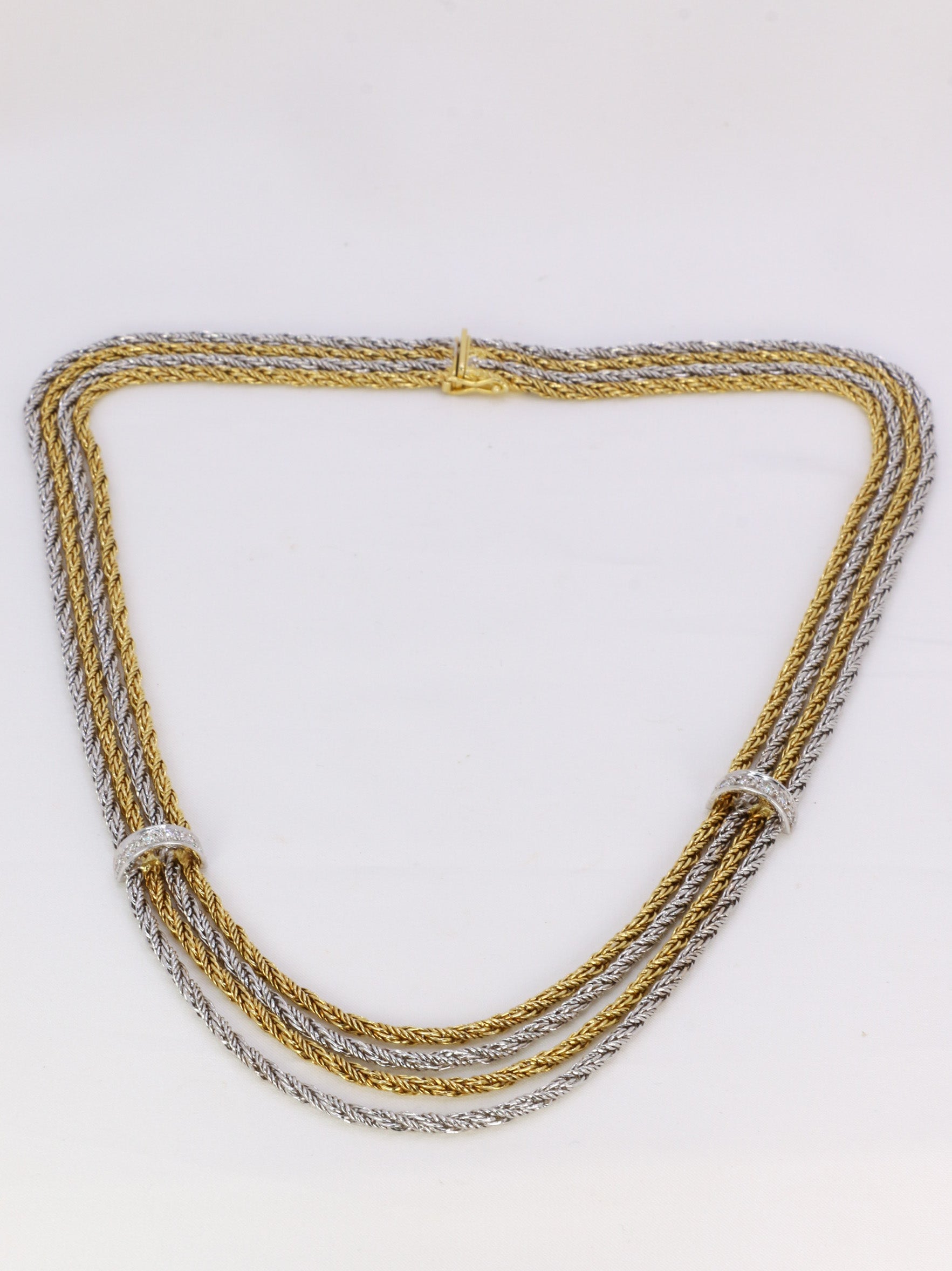 Vintage four-row drapery necklace in gold and diamonds