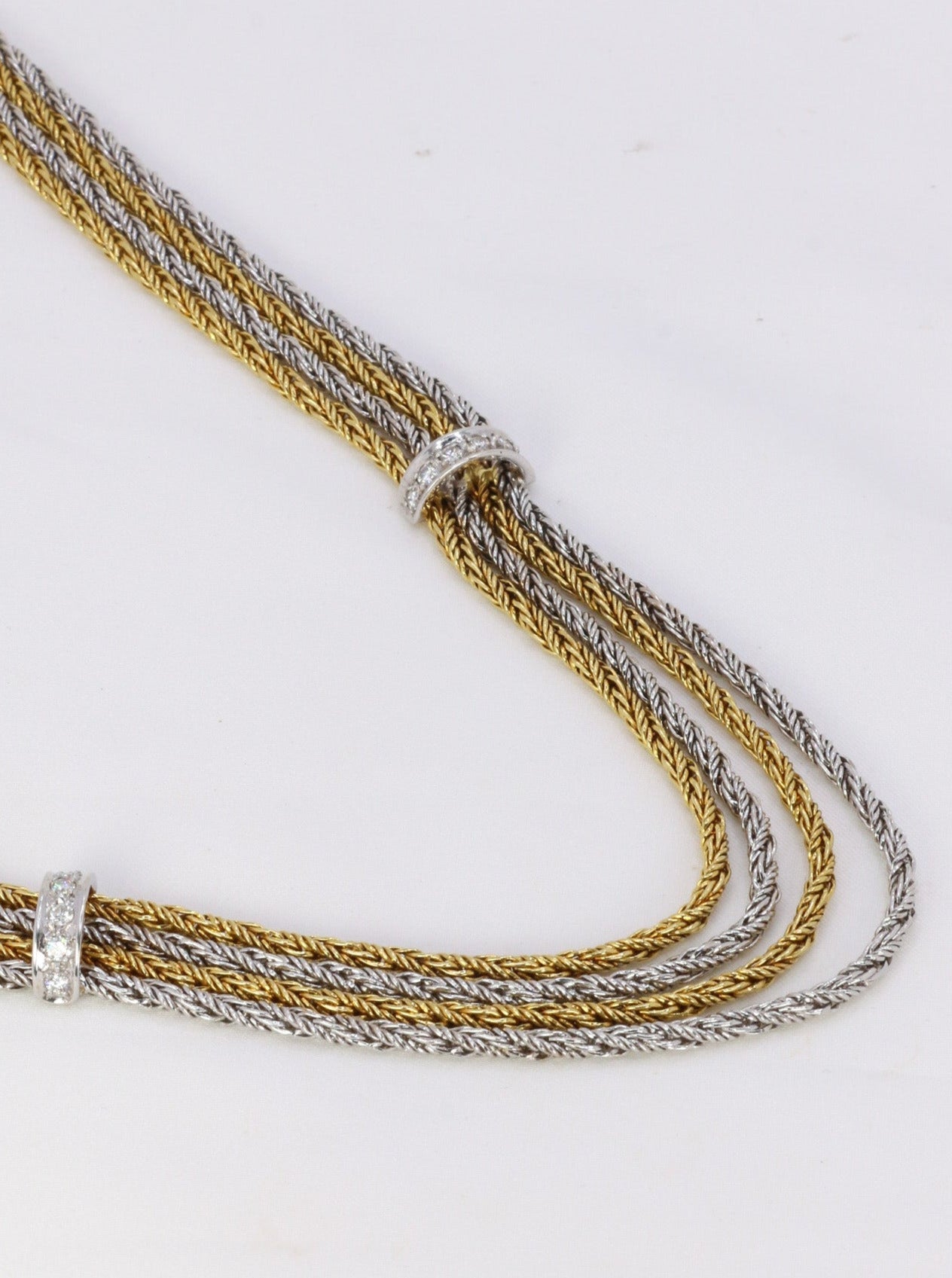 Vintage four-row drapery necklace in gold and diamonds