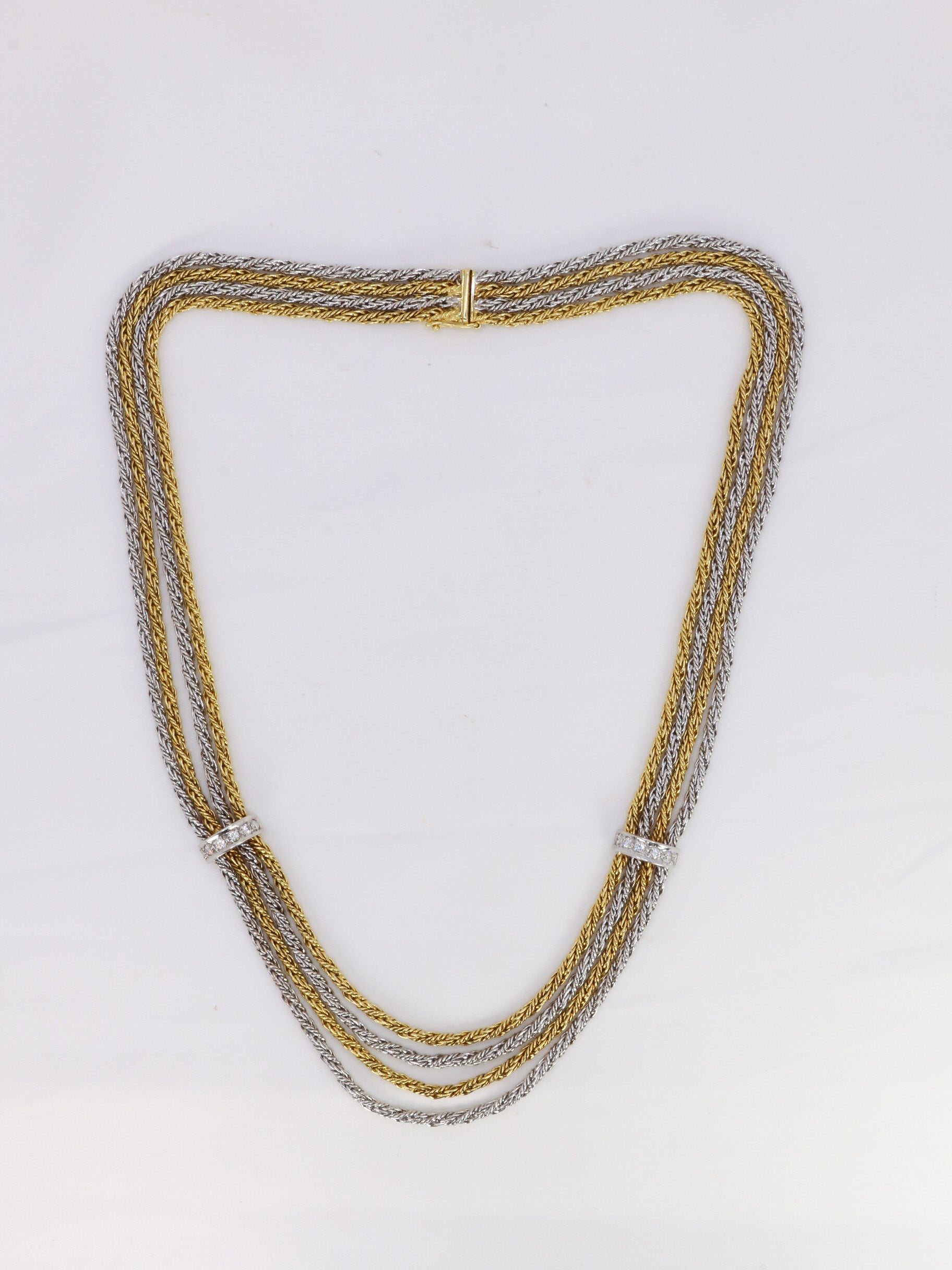 Vintage four-row drapery necklace in gold and diamonds