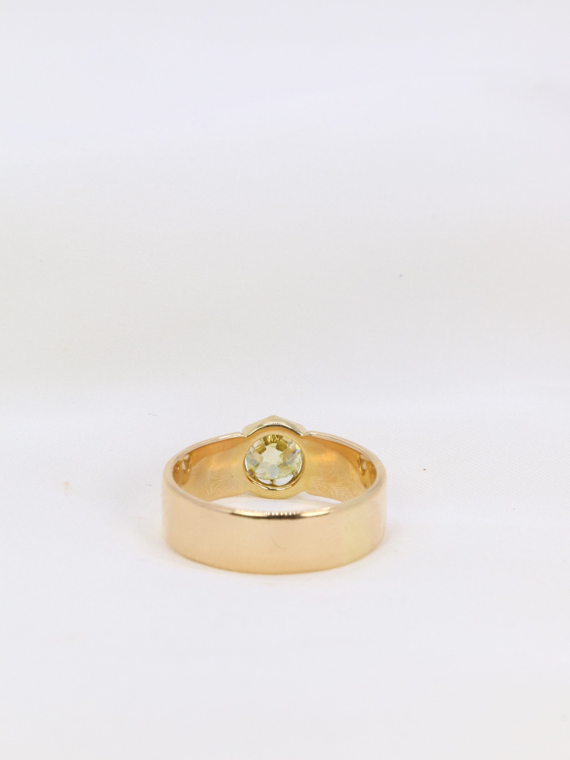 Fancy Yellow 1.1 ct old-cut cushion-cut diamond and gold ring