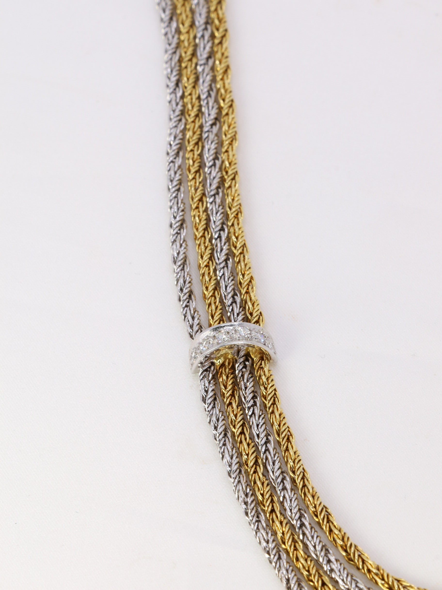 Vintage four-row drapery necklace in gold and diamonds