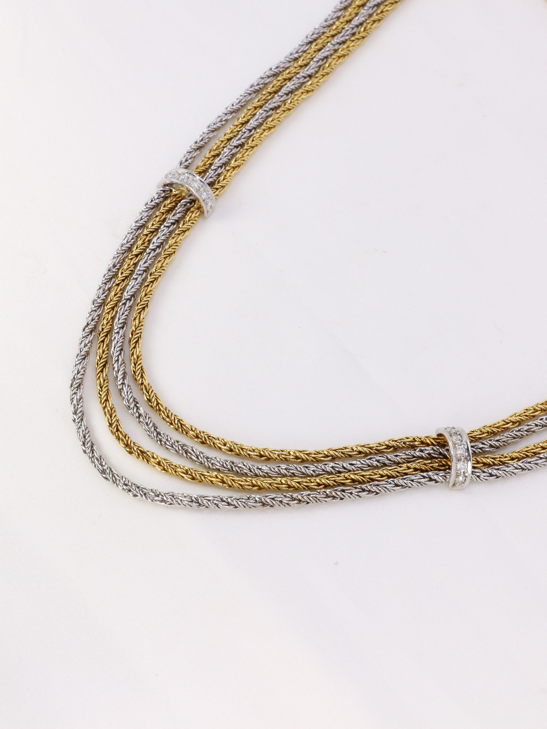 Vintage four-row drapery necklace in gold and diamonds