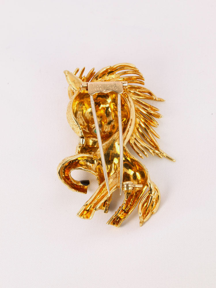 Broche Poney vintage Van Cleef &amp; Arpels or jaune émeraude diamants émail