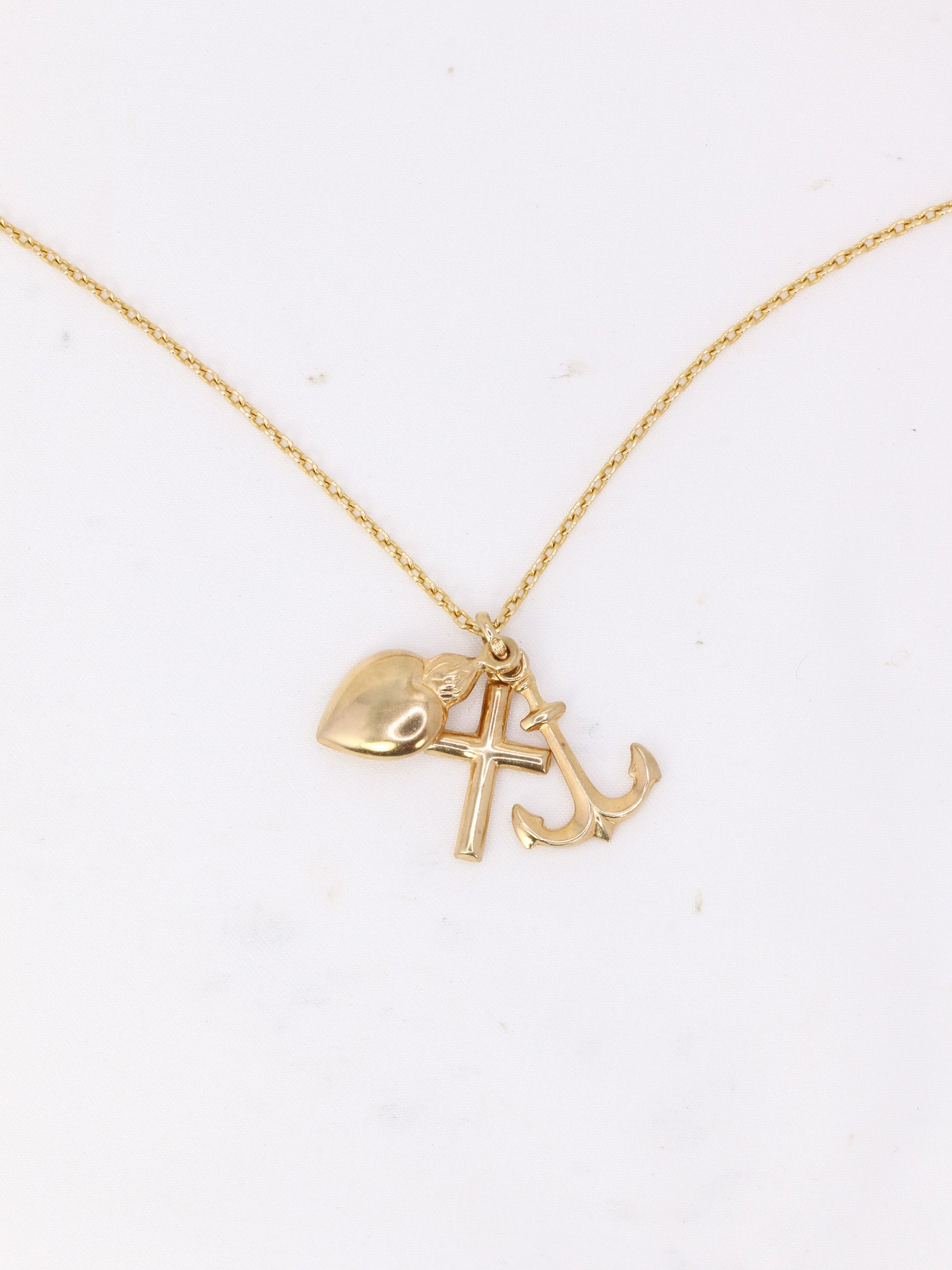 Vintage Hope, Faith, Charity Uno A Erre pendant in yellow gold