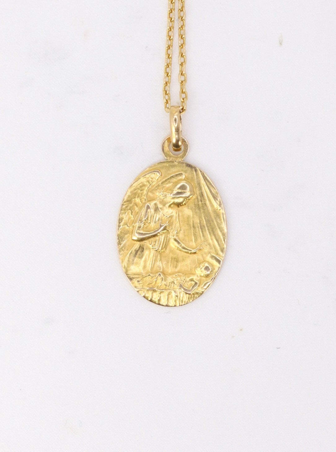 Religious medal in yellow gold, healing prayer to Archangel Raphael