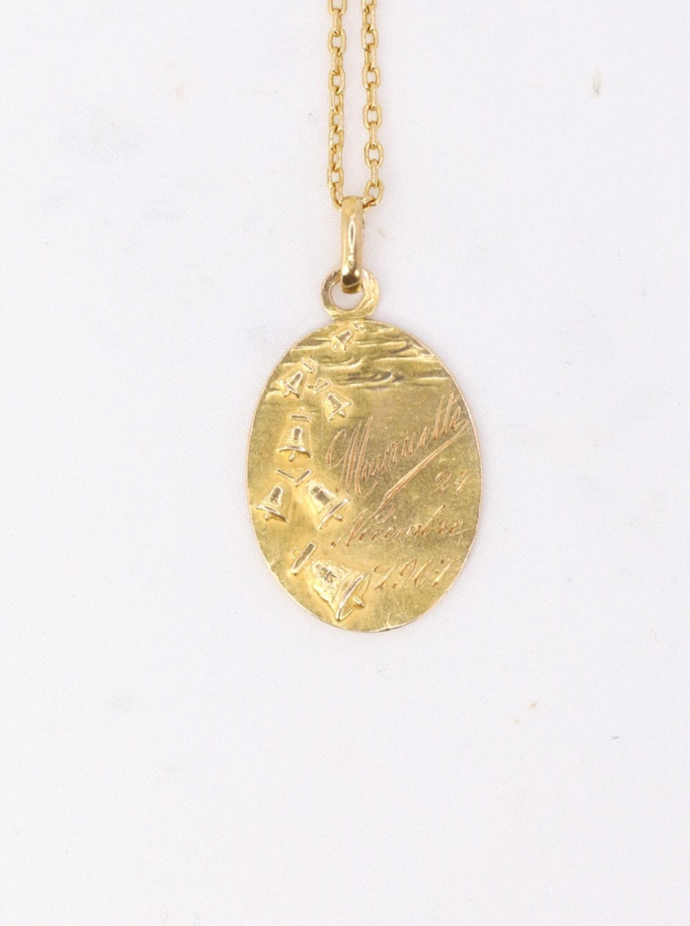 Religious medal in yellow gold, healing prayer to Archangel Raphael