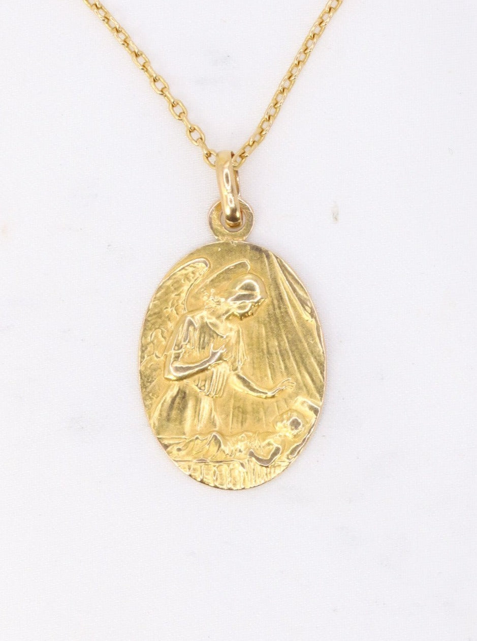 Religious medal in yellow gold, healing prayer to Archangel Raphael